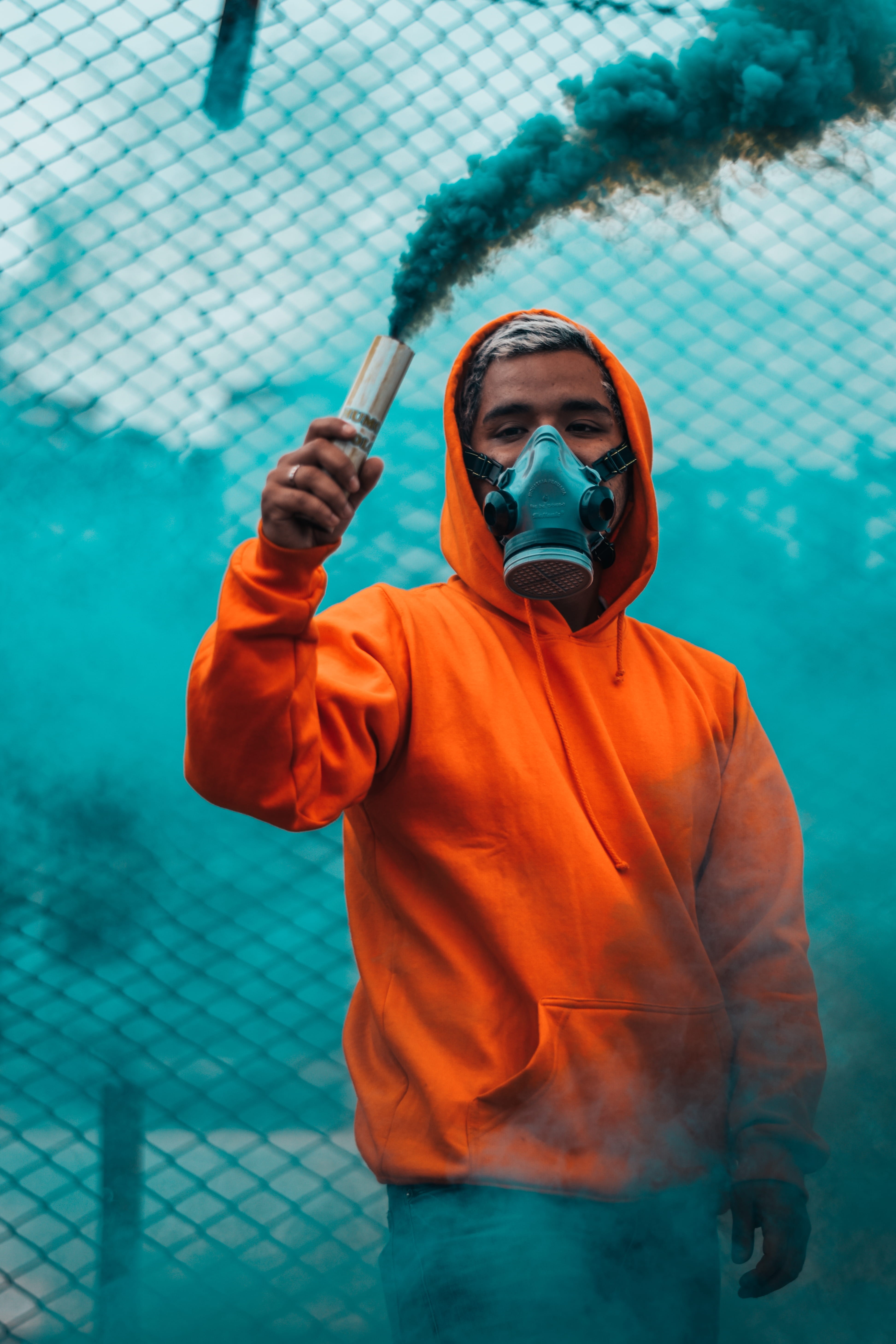 hoody, smoke, mask, leisure activity, mature men, holding, security, three quarter length, chainlink fence, pullover, wearing, day, flare, waist up, protection, Phone HD Wallpaper