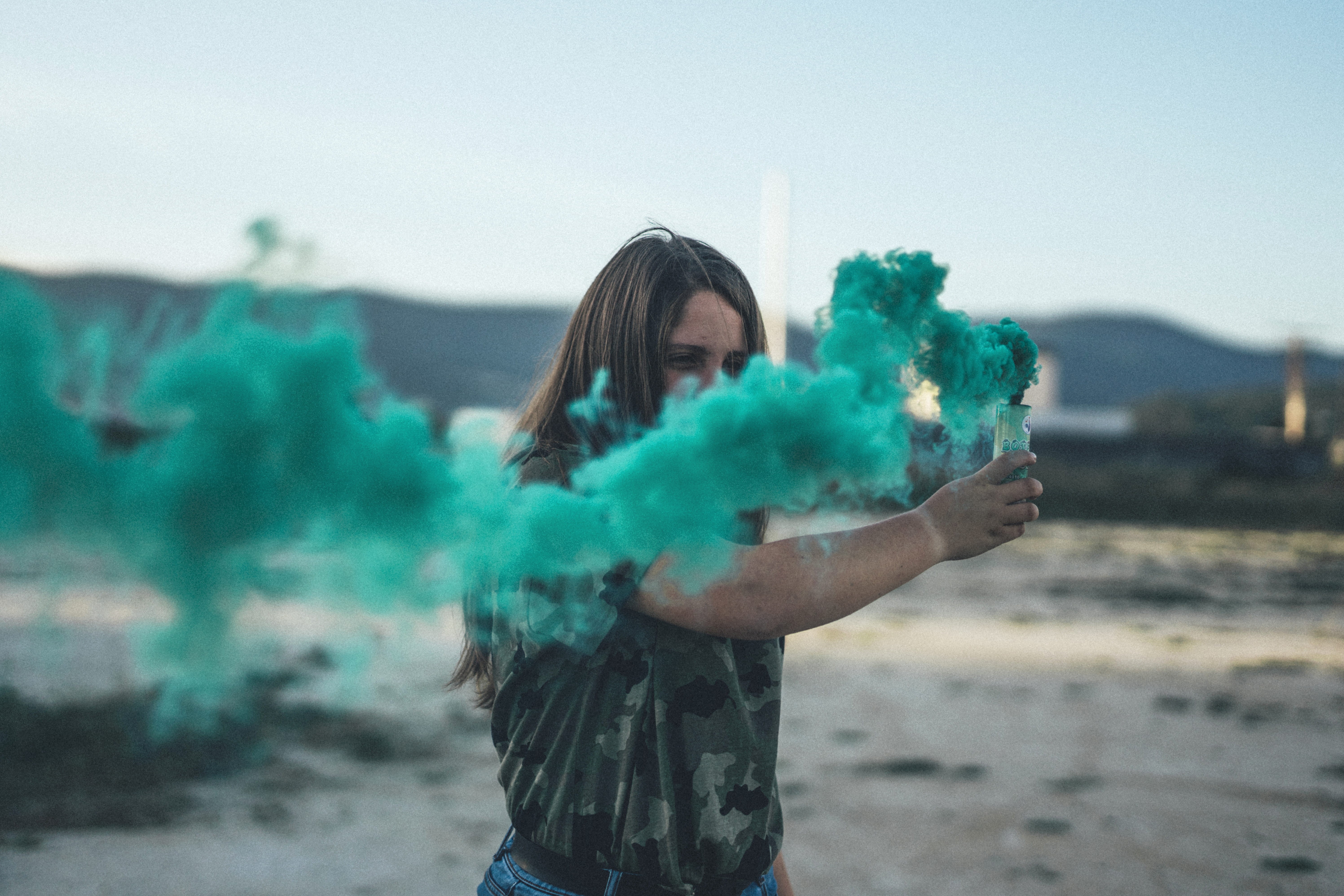 explosive, bottle, casual clothing, glass, holding, smoke - physical structure, woman, warning sign, clear, day, communication, focus on foreground, land, HD Wallpaper