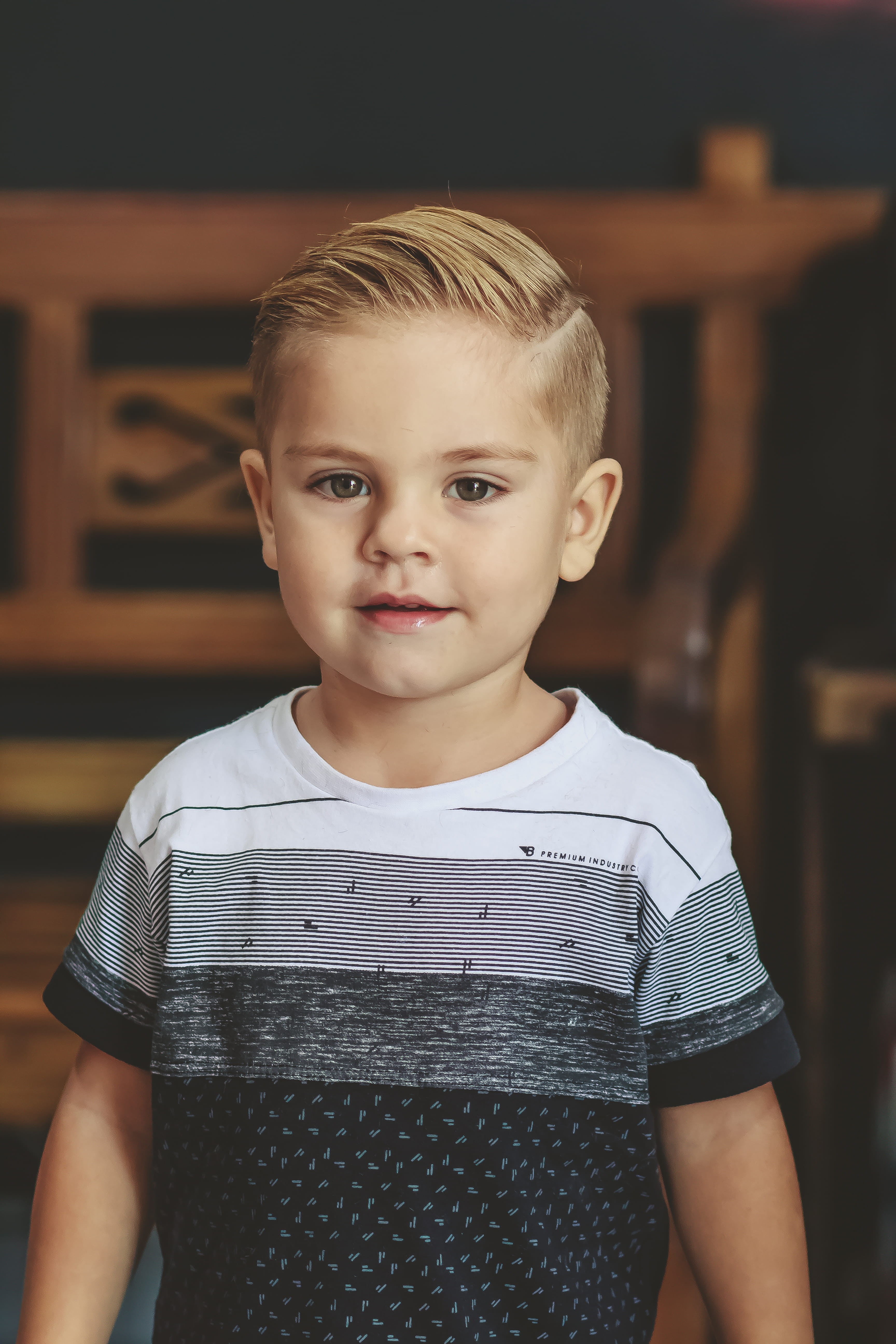 indoors, little, boy, wearing, real people, shirt, looking at camera, smiling, t, black, 5K, focus on foreground, child, waist up, one person, portrait, Phone HD Wallpaper