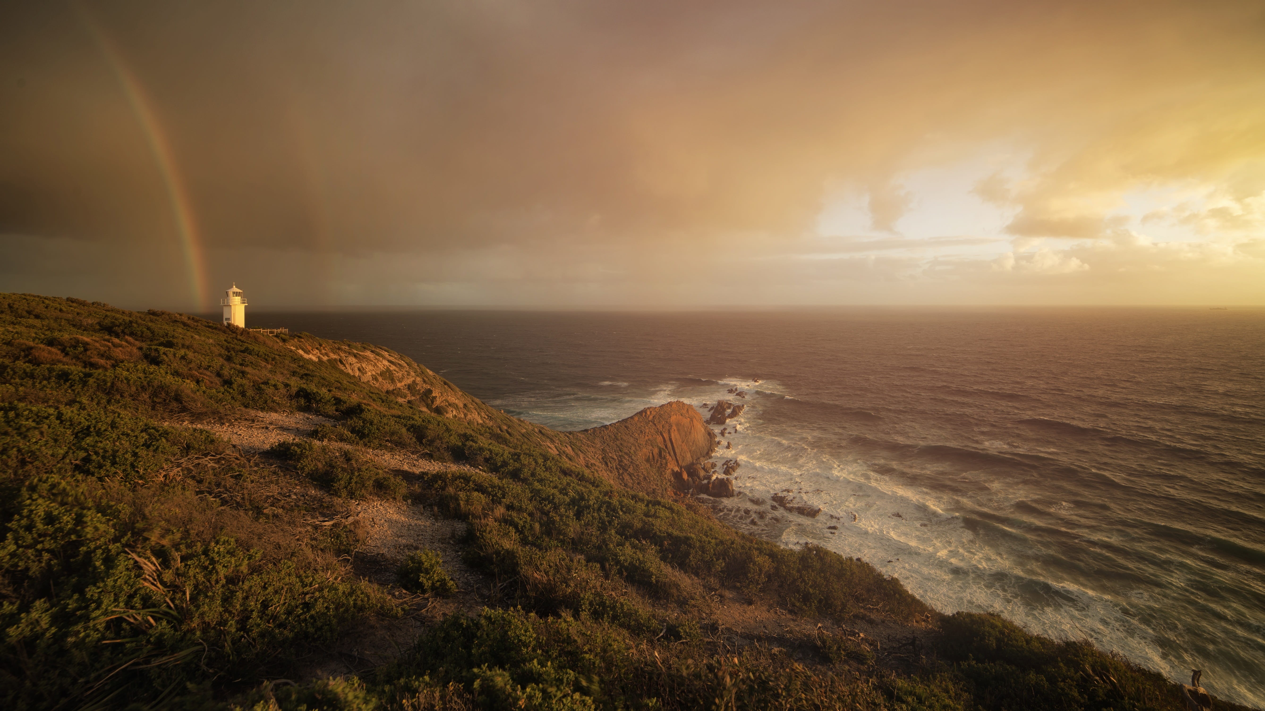 peaceful, building exterior, golden, rainbow, landscape, sky, sunset, seascape, shore, nature, lighthouse, rocks, orange, coast, water, sea, coastline, HD Wallpaper
