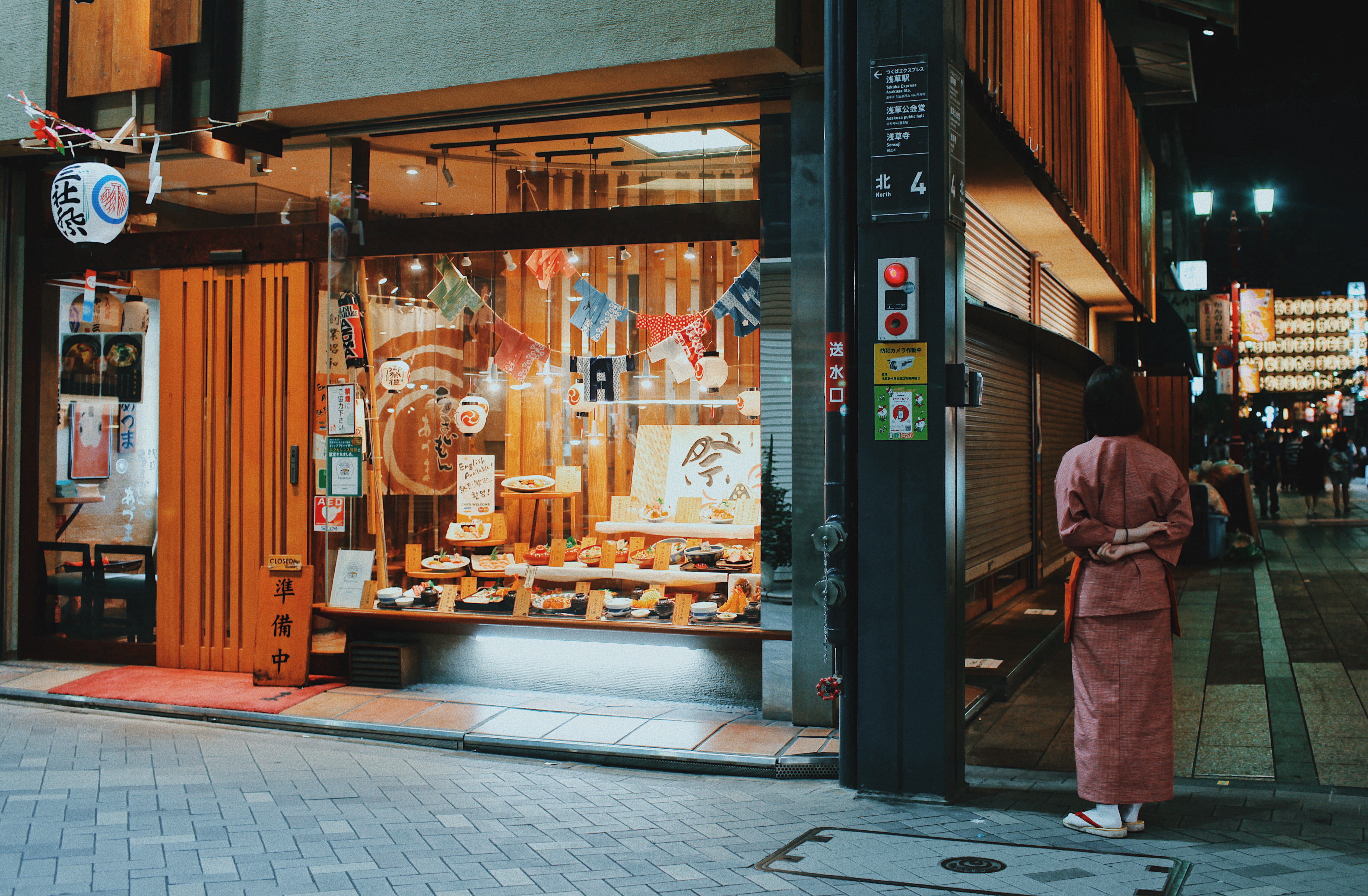shop front, footpath, street, cafe, standing, shop from, city, one person, night time, walking, stree, men, near, building exterior, city stree, woman, HD Wallpaper