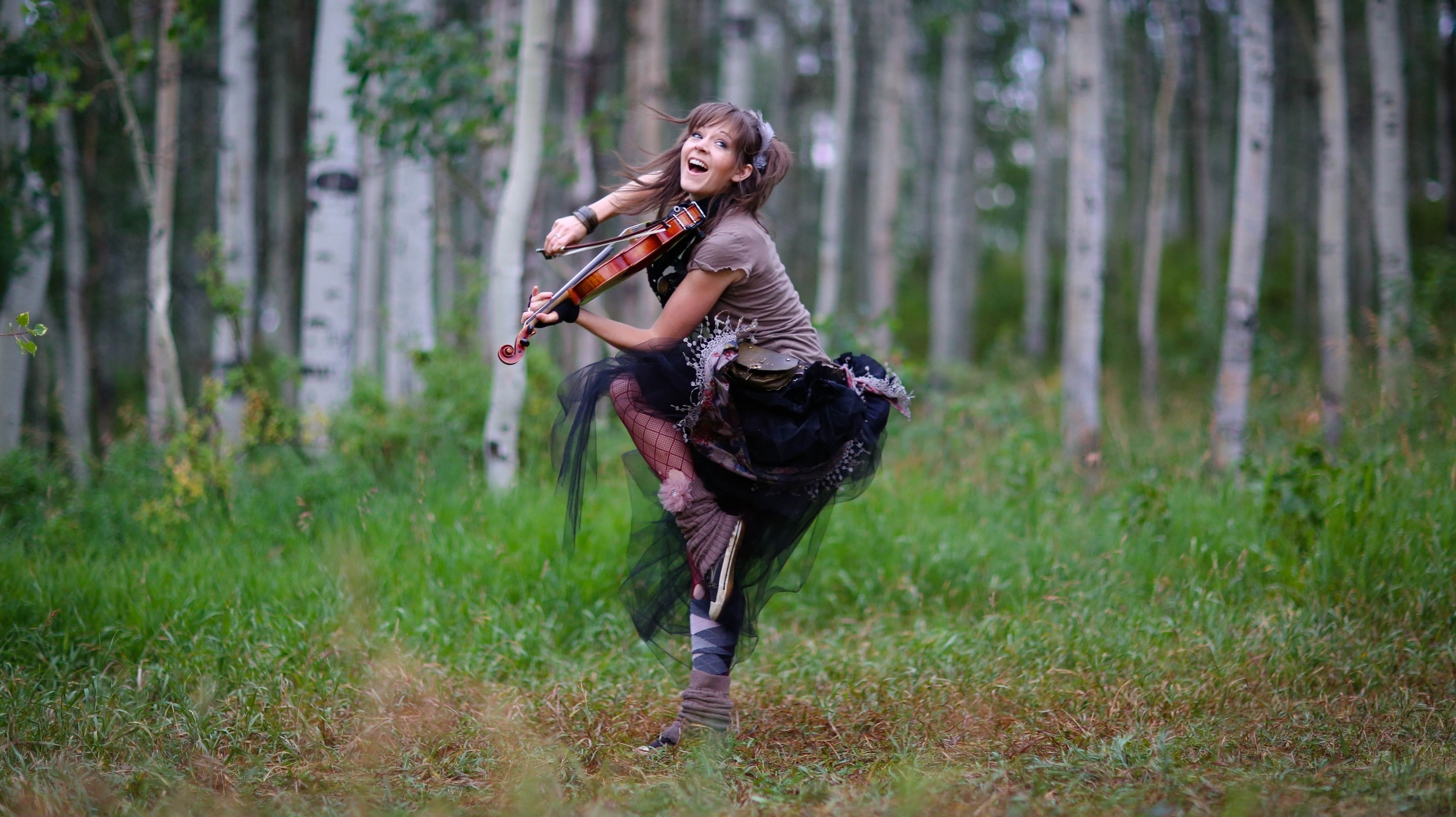 one person, hair, Lindsey Stirling, hairstyle, land, musical instrument, outdoors, woodland, adult, hunter, violin, plant, holding, nature, women, forest, HD Wallpaper