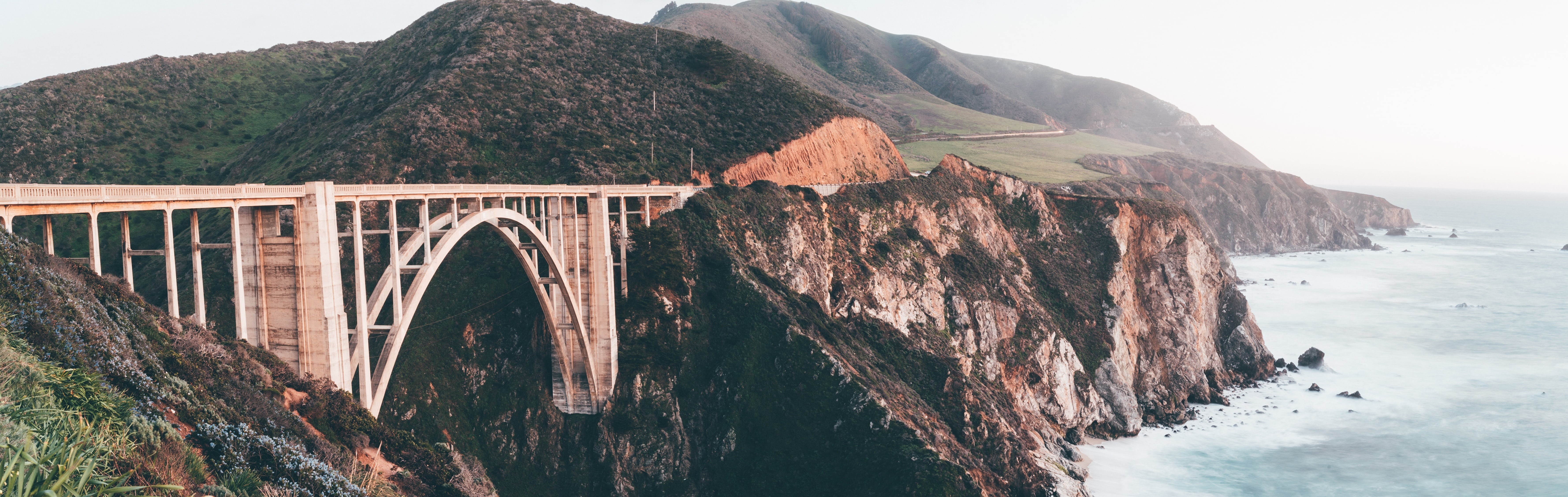 dusk, arch bridge, land, built structure, sea, sunset, famous, vacation, transportation, calm, outdoors, fog, water, sky, dawn, mountain, architecture, HD Wallpaper