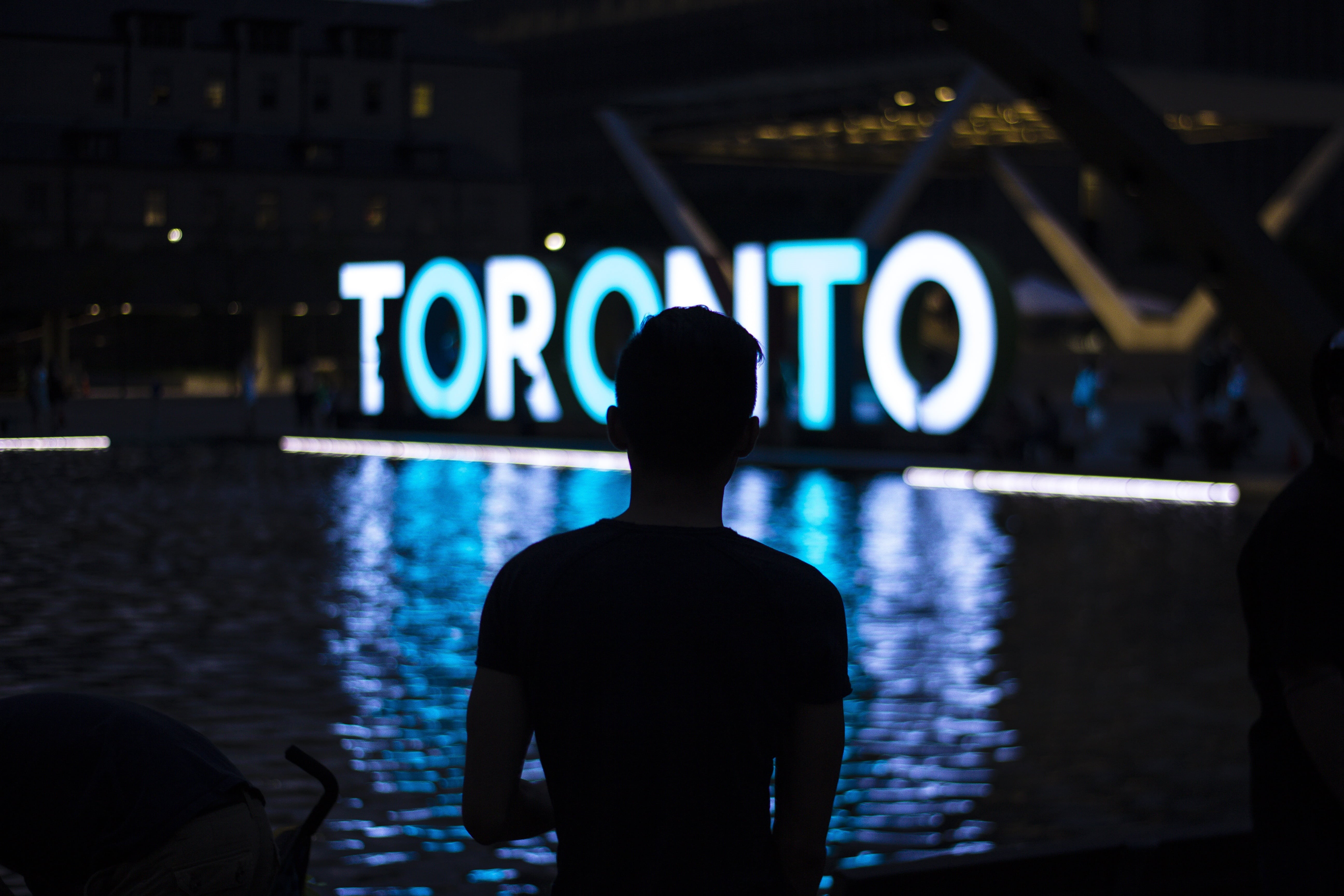 indoors, lights, one person, focus on foreground, standing, dark, number, crew, shirt, neck, men, illuminated, guy, people, man, waist up, Toronto, rear view, HD Wallpaper