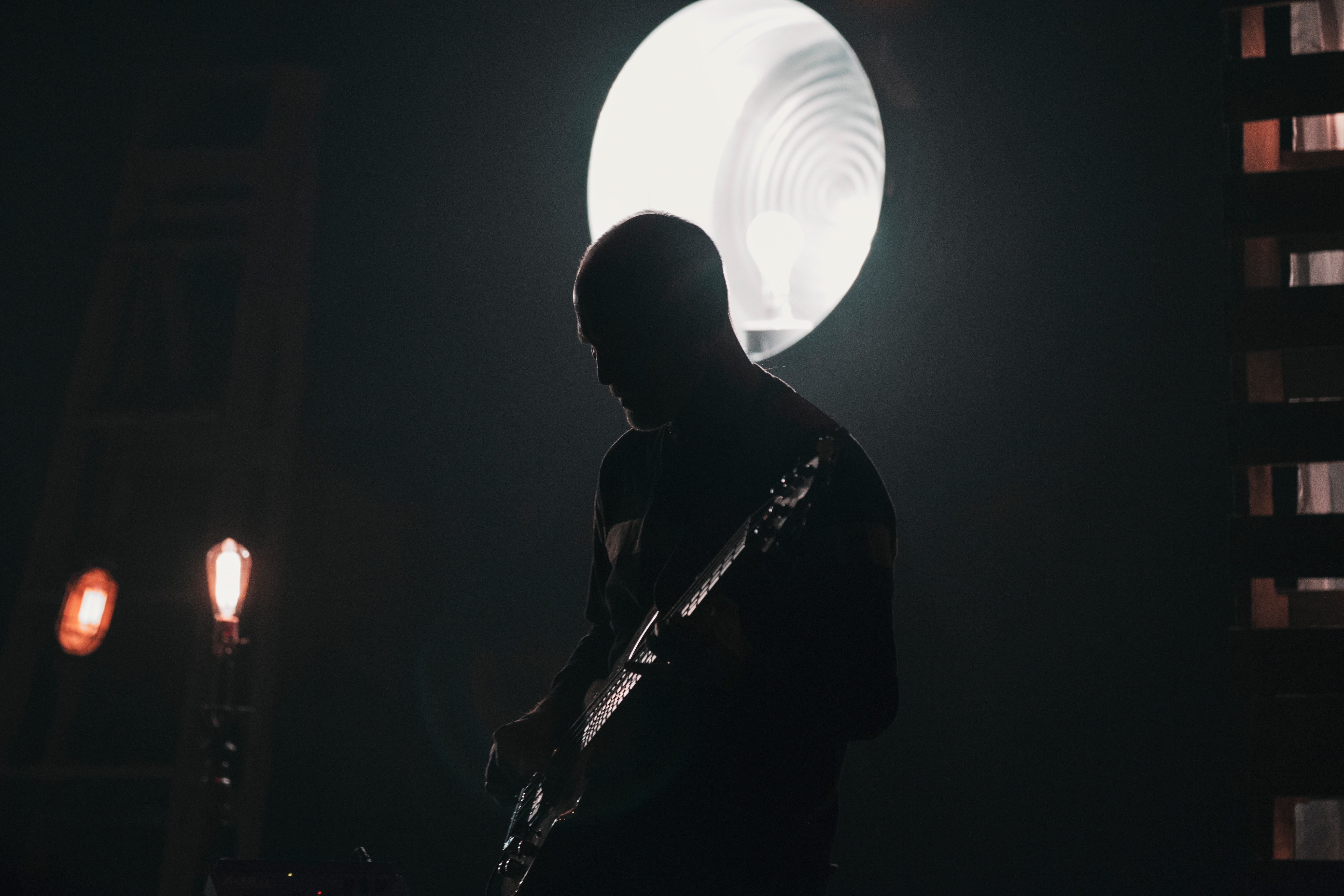 one man only, only men, adult, sound, musician, holding, men, band, music, playing, night, standing, bulb, dark, indoors, lifestyles, architecture, people, HD Wallpaper