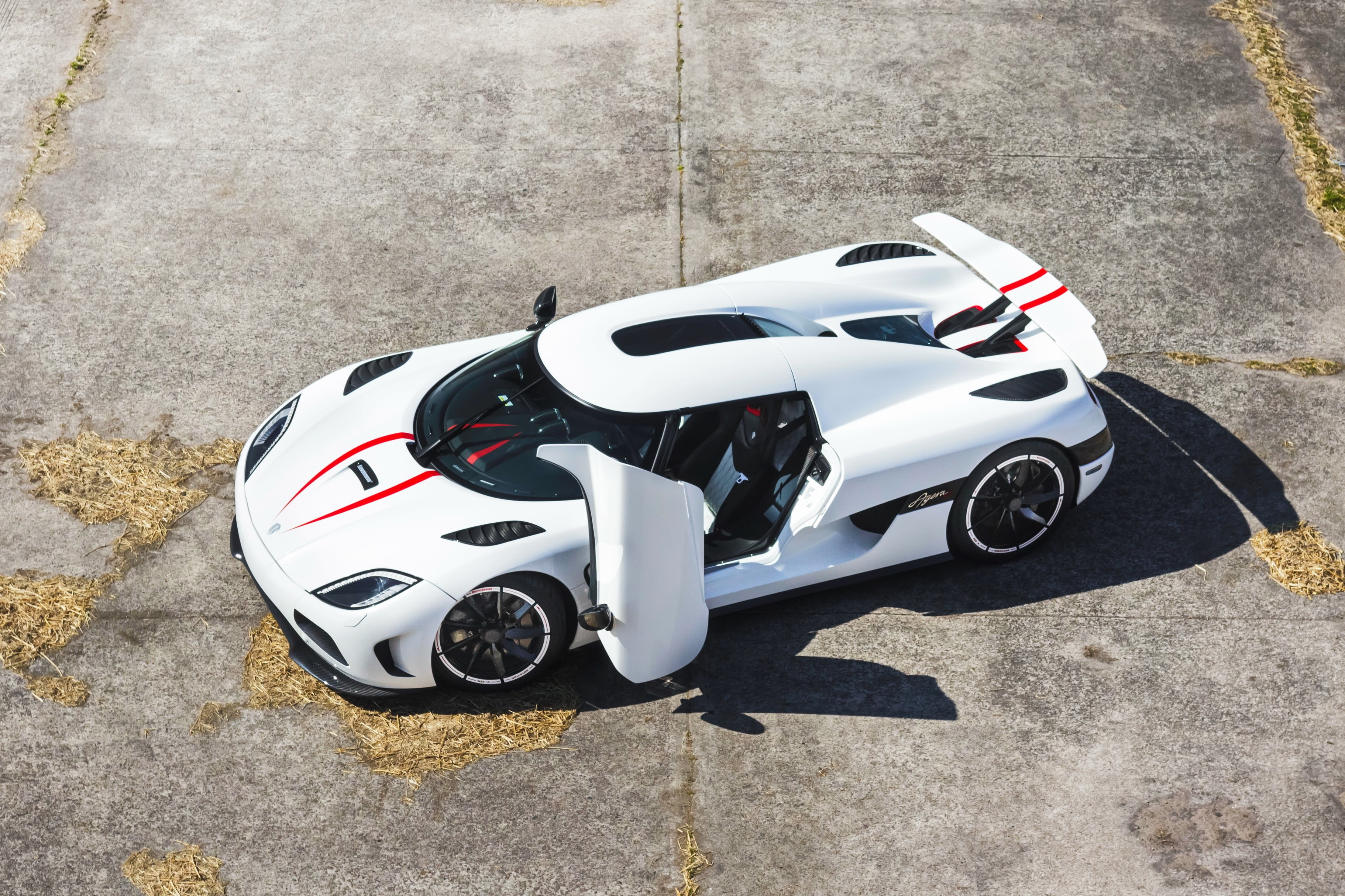 crash helmet, hypercar, transportation, city, motor racing track, mode of transportation, Agera R, veyron, motor vehicle, 2K, street, white, day, stationary, HD Wallpaper