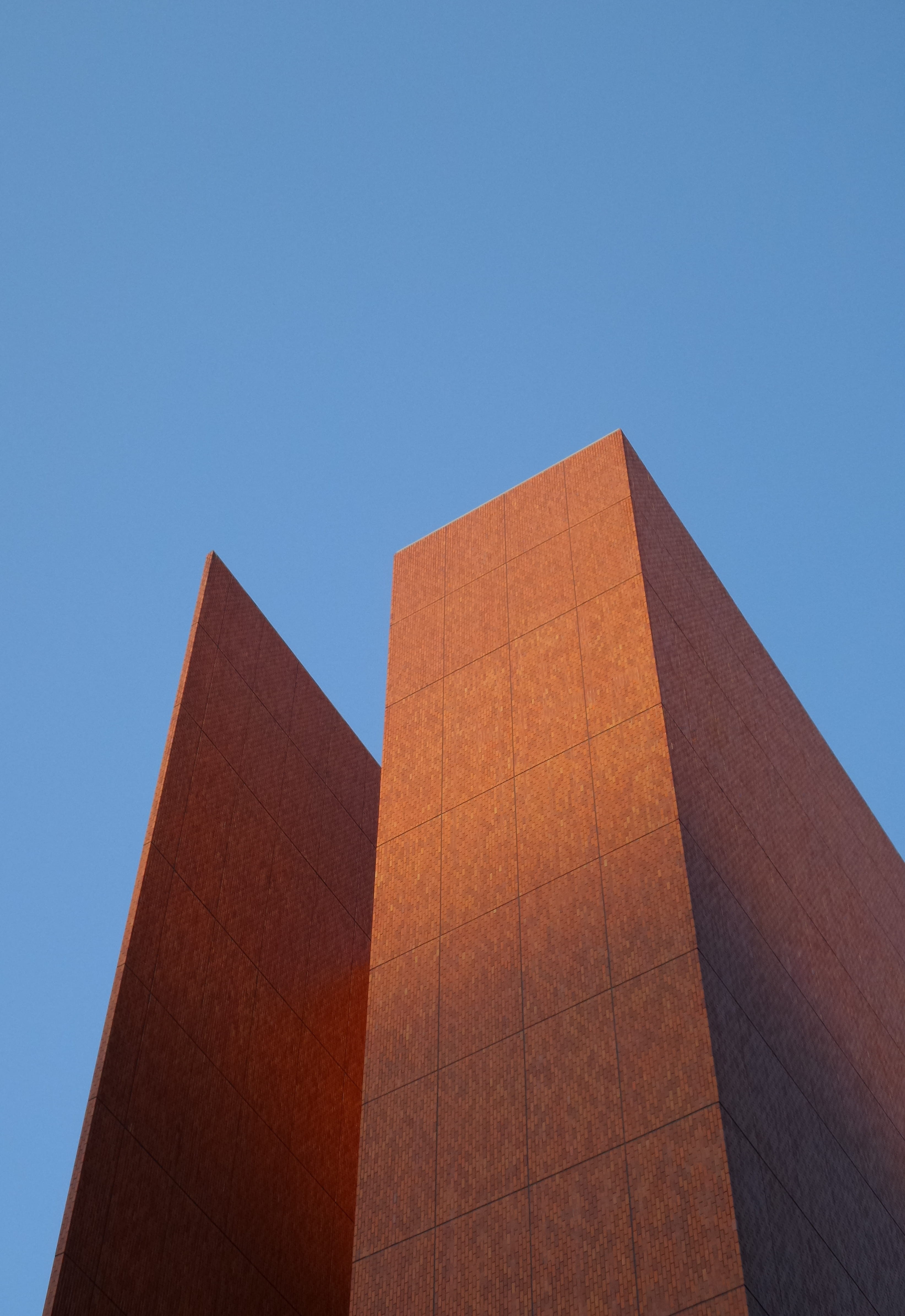 nature, skyscraper, built structure, above, top, clear sky, geometric, windowless, 4K, red, geometry, angles, outdoors, sunny, no people, day, wall, block, Phone HD Wallpaper