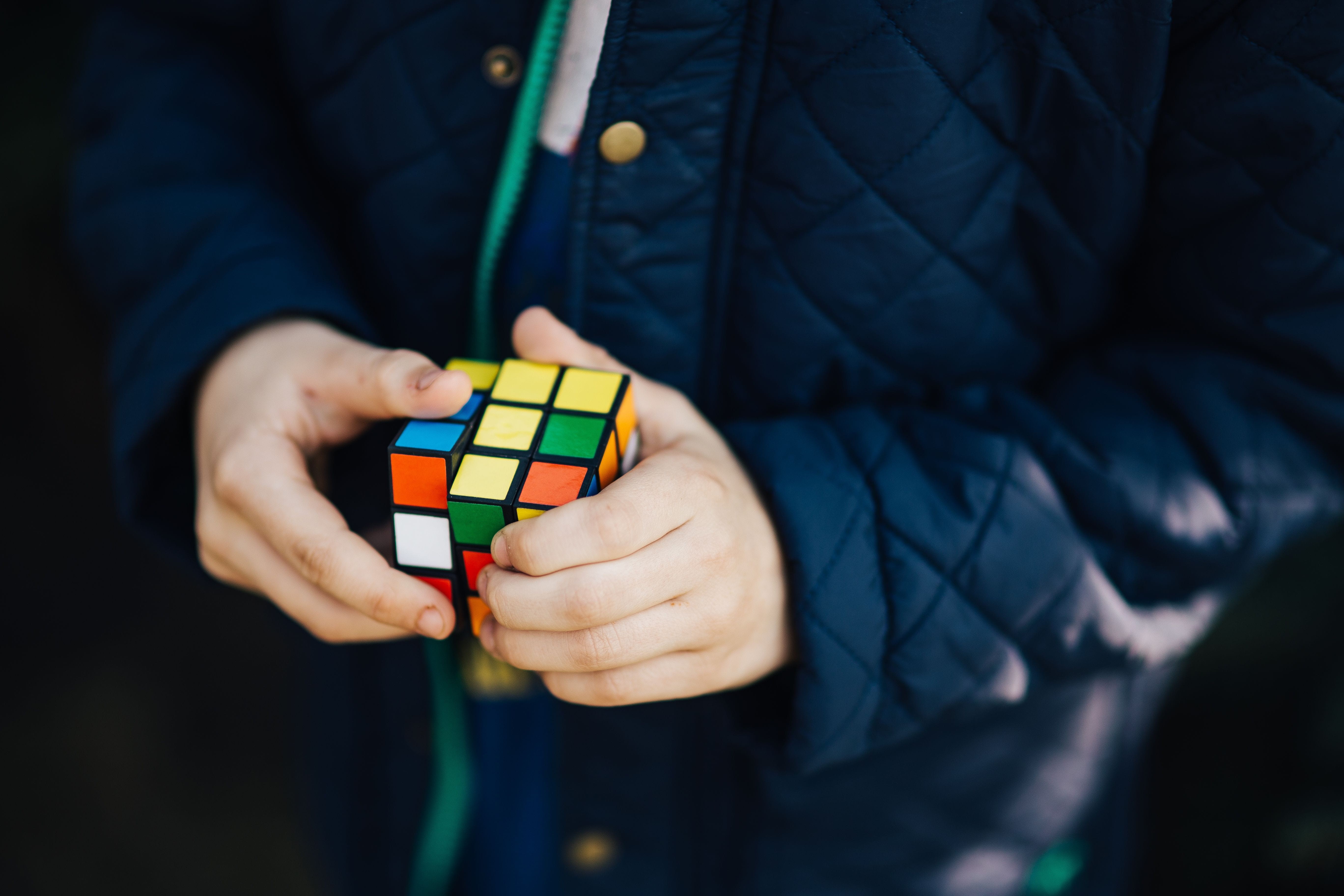 people, things, blue, human body part, standing, jacket, leisure activity, finger, indoors, adult, rubiks cube, ball, Boy, hand, one Person, holding, real people, HD Wallpaper