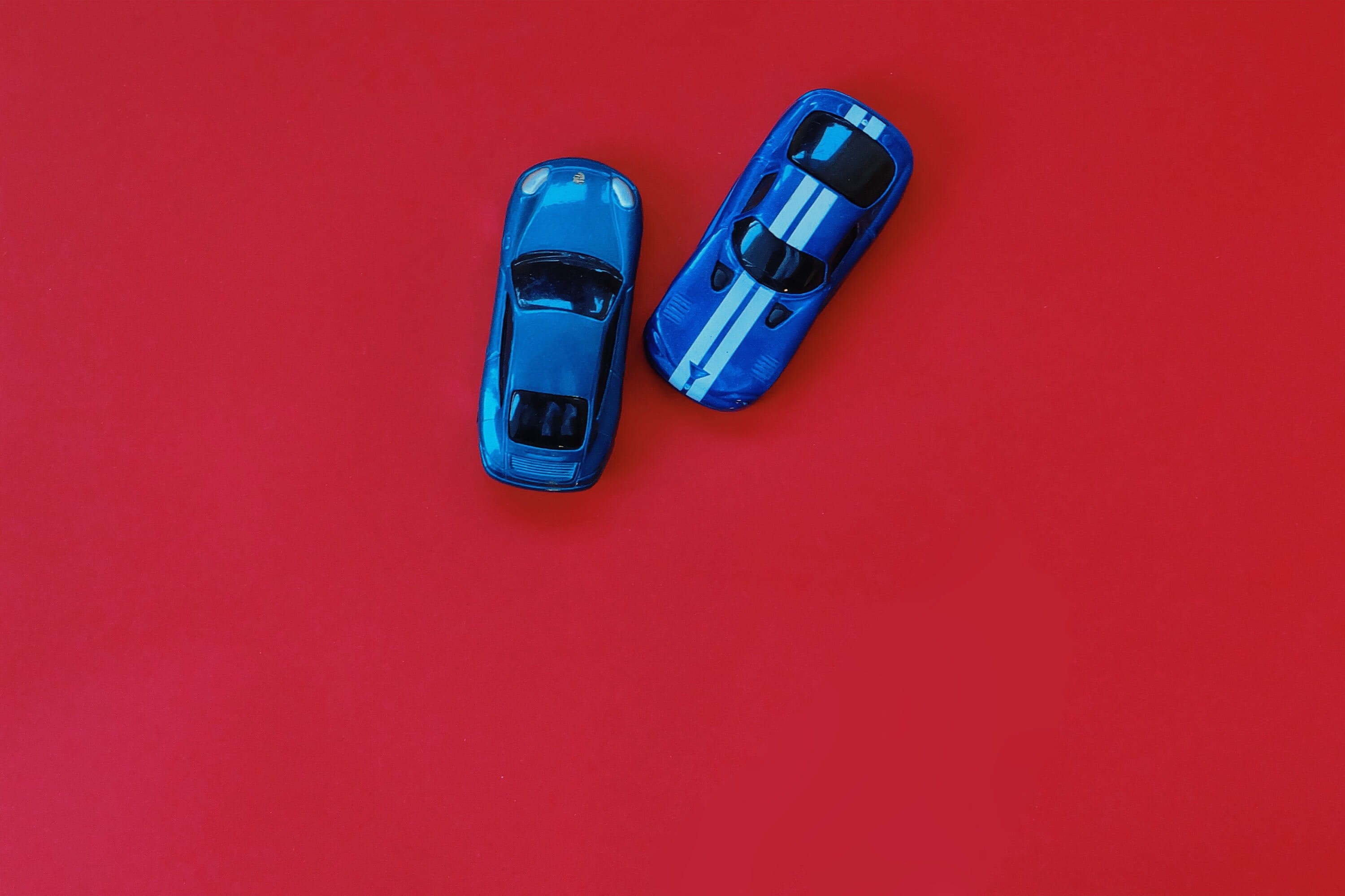 indoors, cars, activity, close-up, red background, toy, blue, 2K, matchbox, side by side, directly above, cast, red, toy cars, fun, die cast toy, porsche, HD Wallpaper