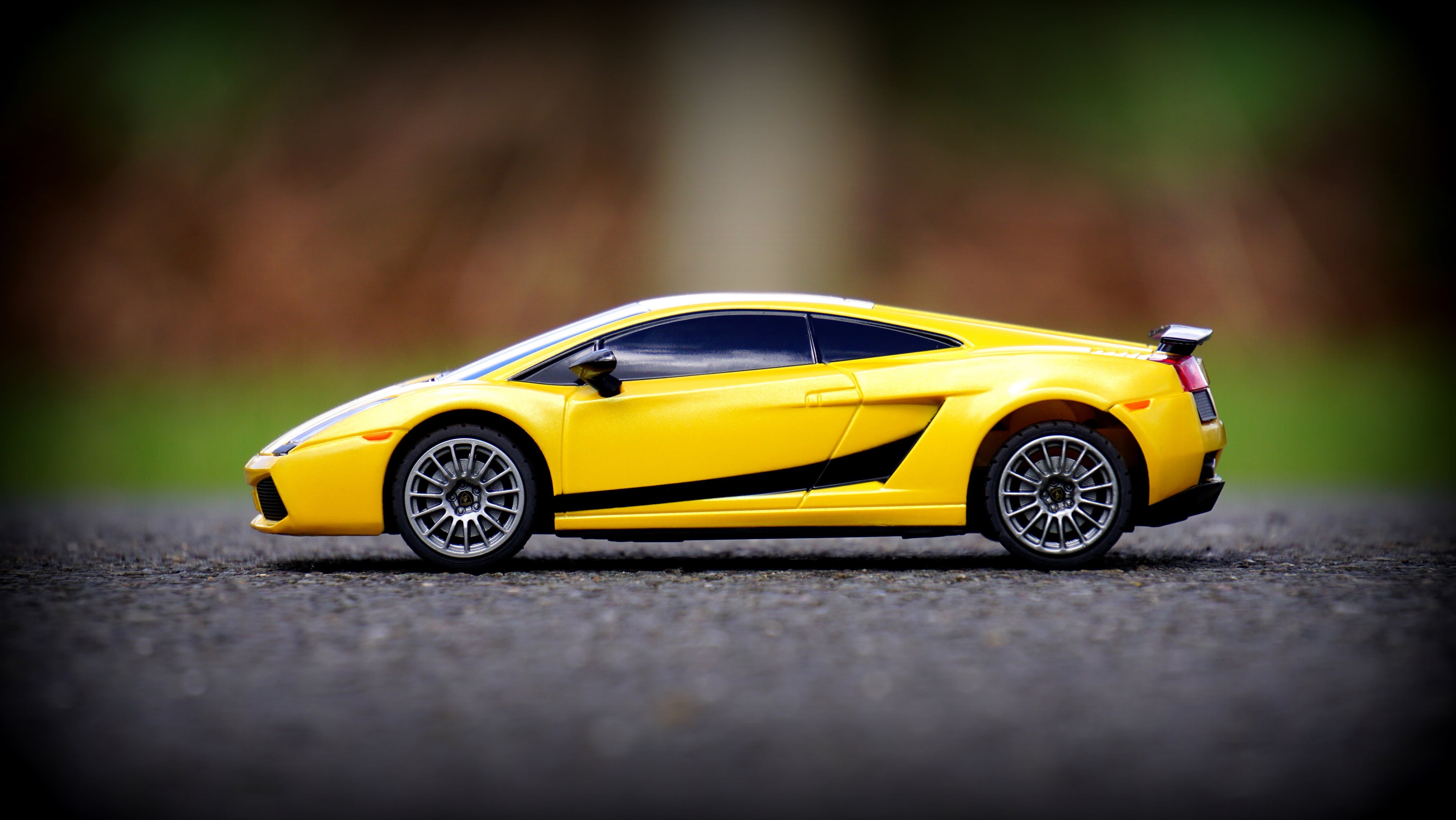 scale, 4K, transportation, sports race, selective focus, pavement, miniature, lamborghini, aventado, yellow, land vehicle, car, road, focus, die, motor vehicle, HD Wallpaper