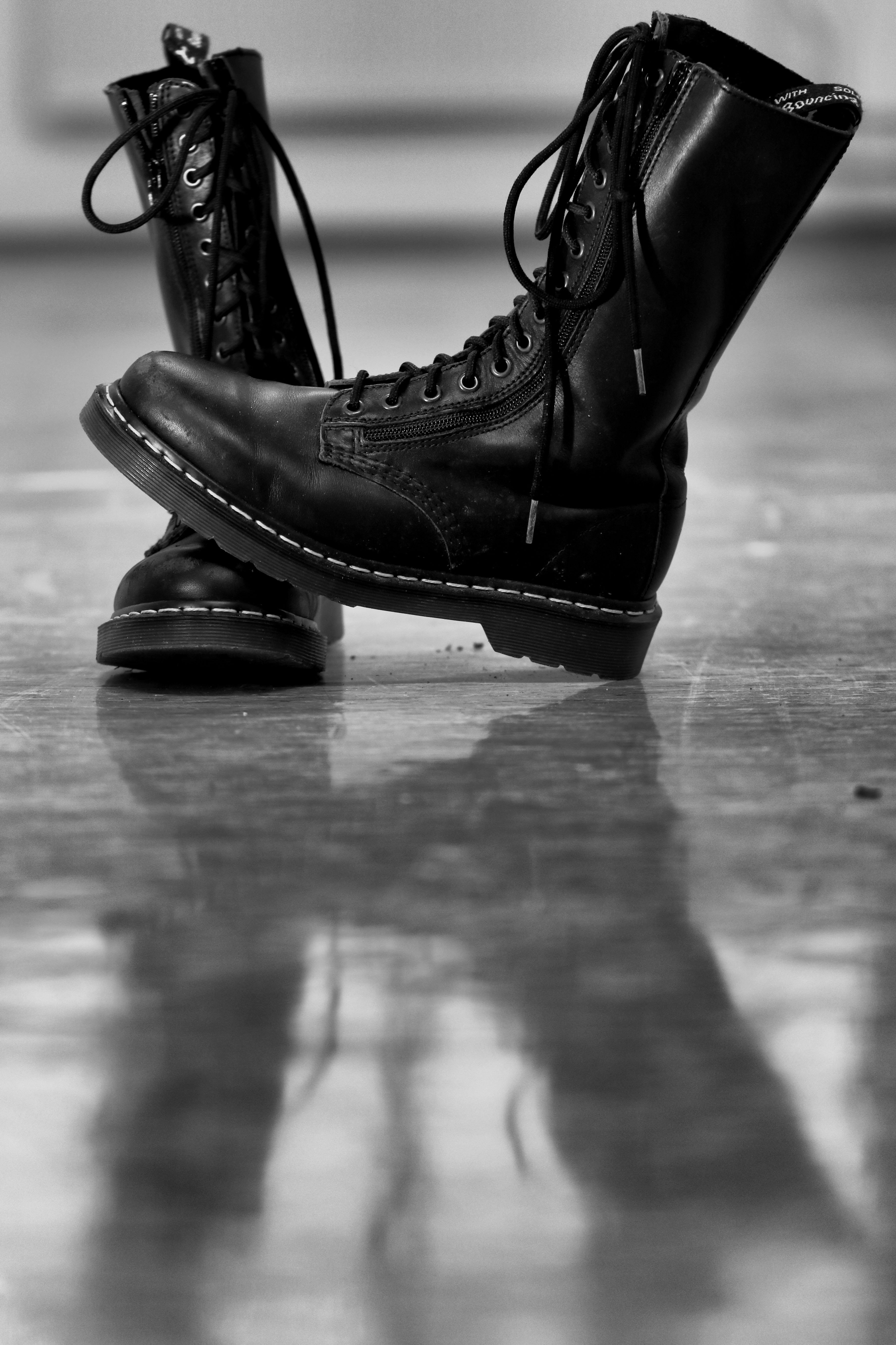 no people, indoors, close-up, flooring, single object, absence, selective focus, shoe, black, boots, shoes, surface, clothing, wood, personal accessory, Phone HD Wallpaper