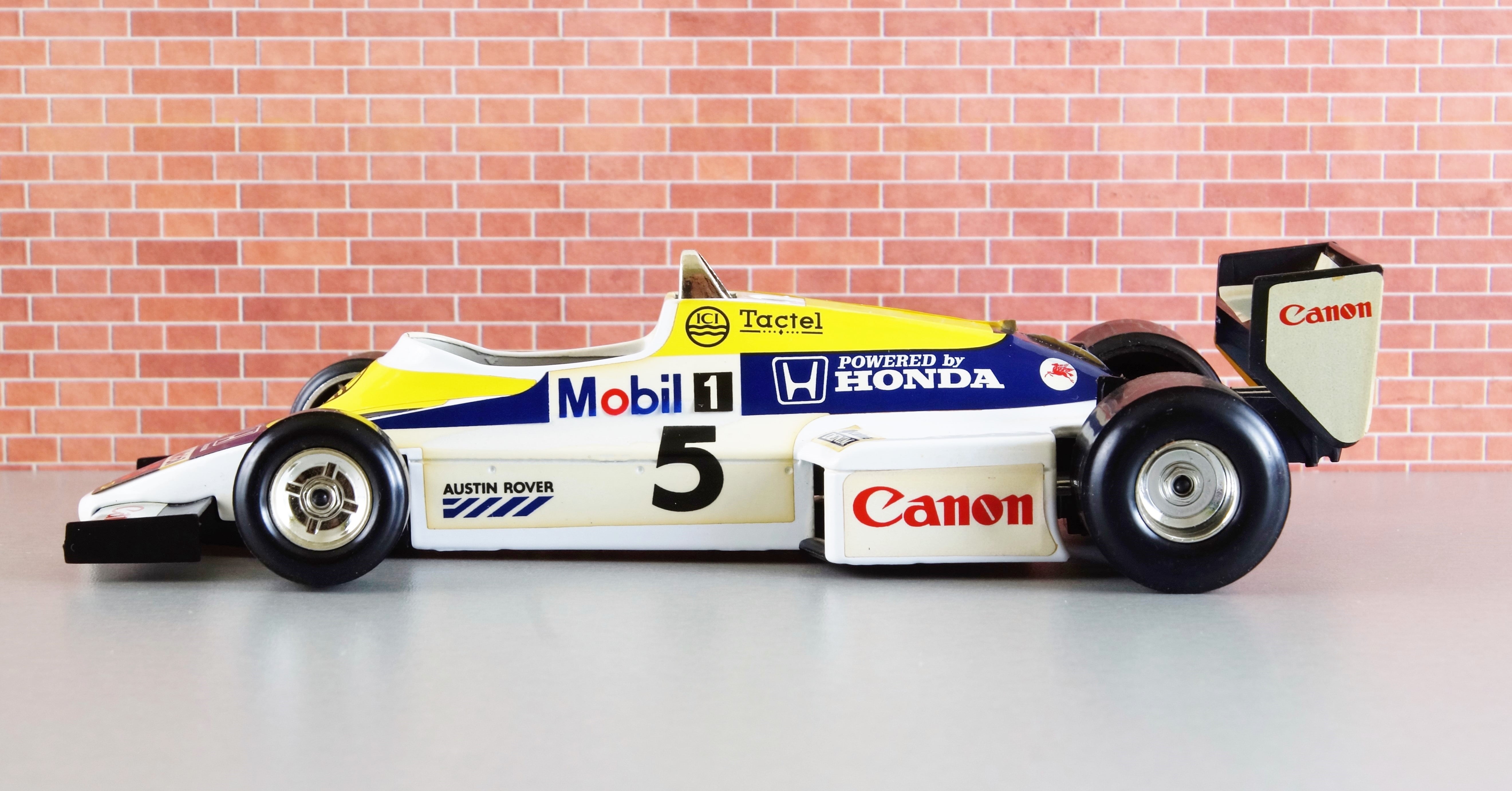 speed, motor vehicle, brick wall, no people, winning, automotive, race, mode of transportation, power, red, model, toy car, sport, success, racing car, HD Wallpaper