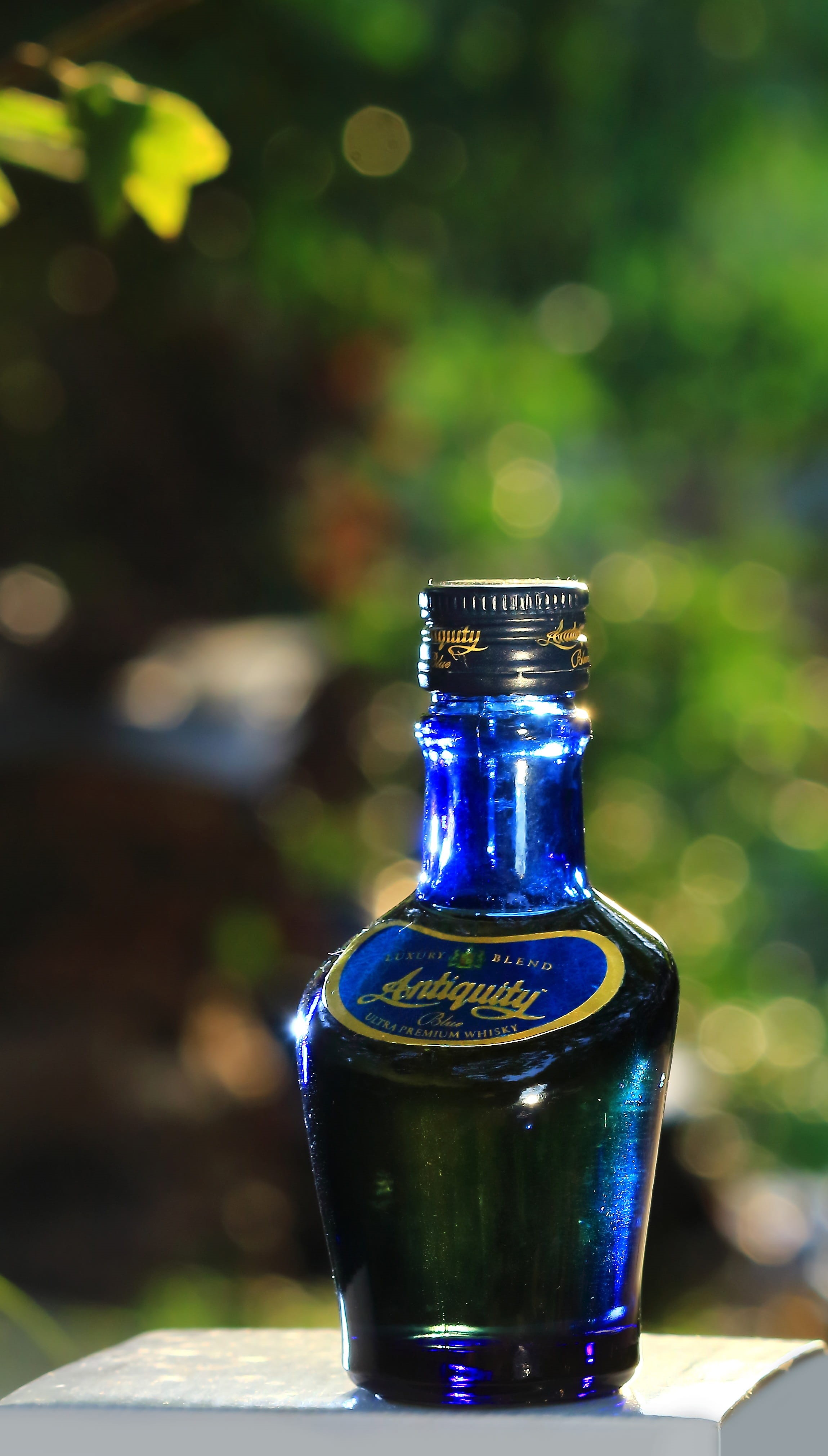 whisky, fresh, nature, focus on foreground, blue, healthy, plant, glass, liquid, drink, sunlight, food, day, beverage, india, refreshment, attitude, isolated, Phone HD Wallpaper