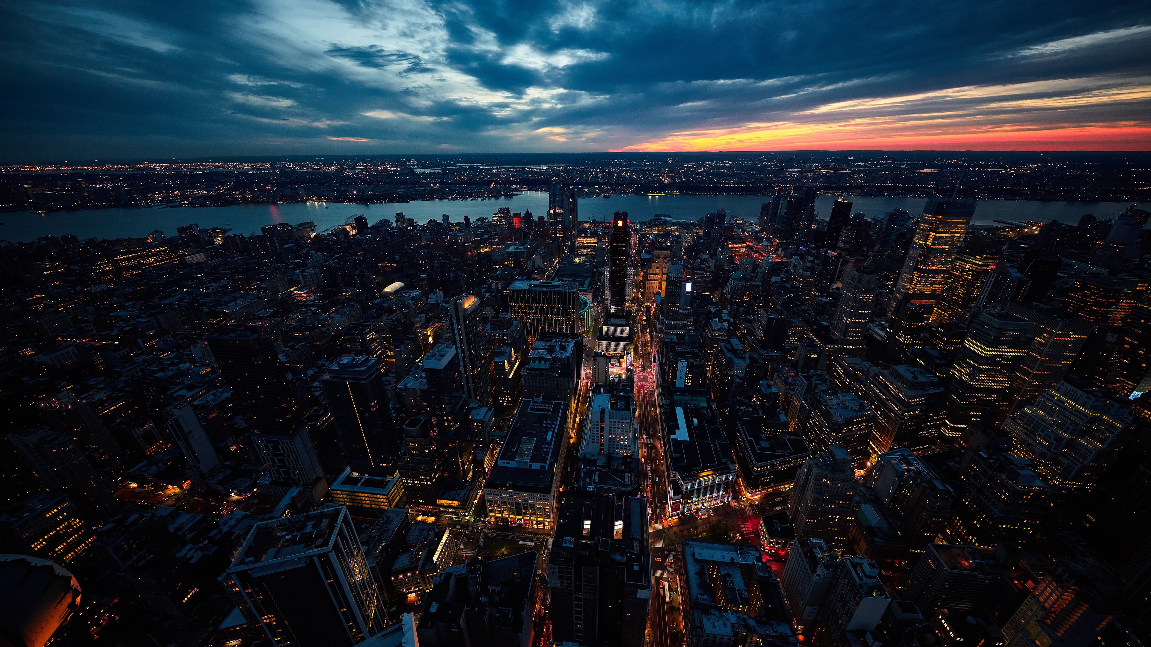 metropolis, aerial photography, built structure, nightlife, new york city, sunset, horizon, illuminated, outdoors, urban skyline, cloud - sky, crowd, financial district, HD Wallpaper