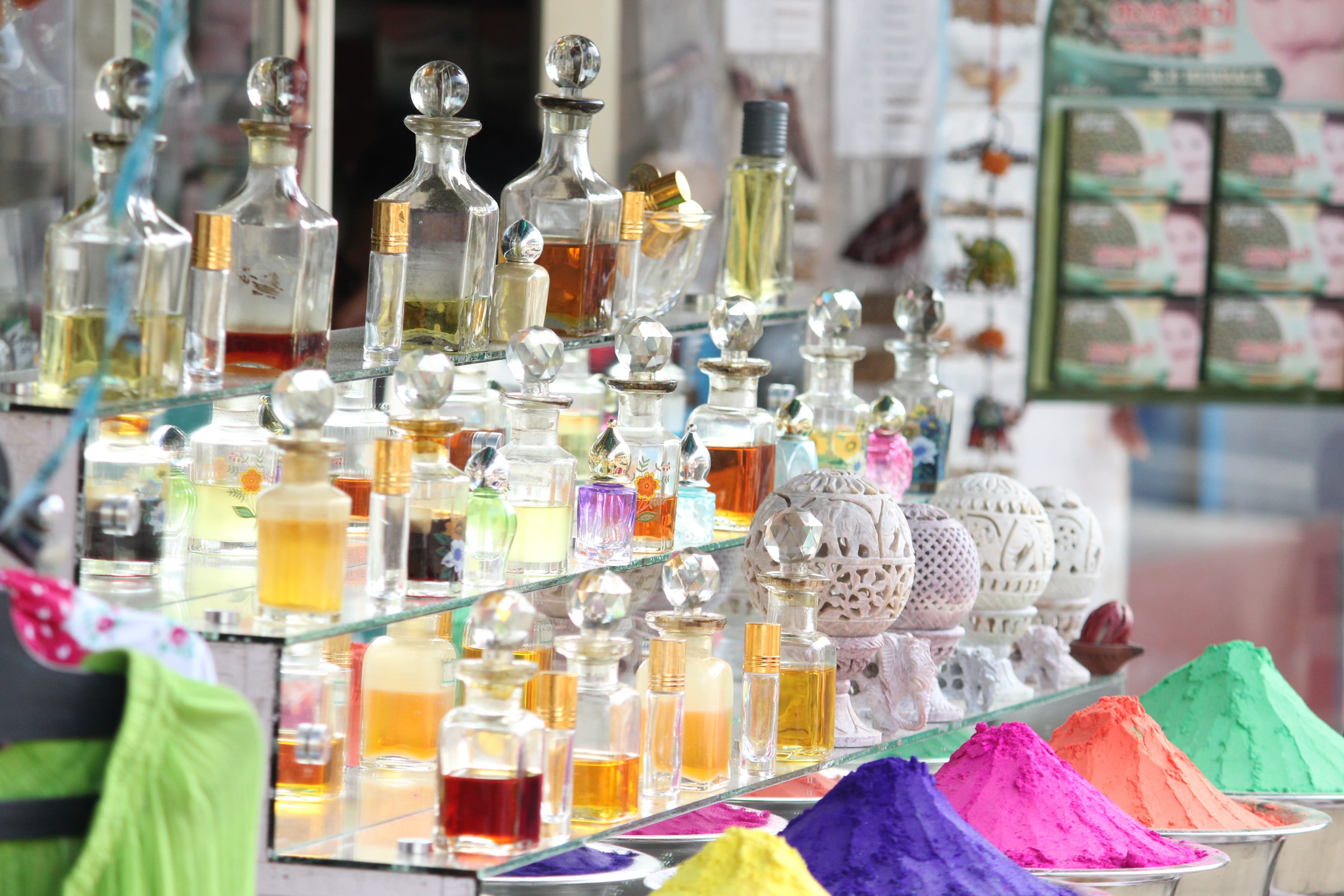 no people, sale, luxury, reflections, perfume sprayer, beauty product, large group of objects, liquid, display, shop, still life, mirror, collection, variation, HD Wallpaper