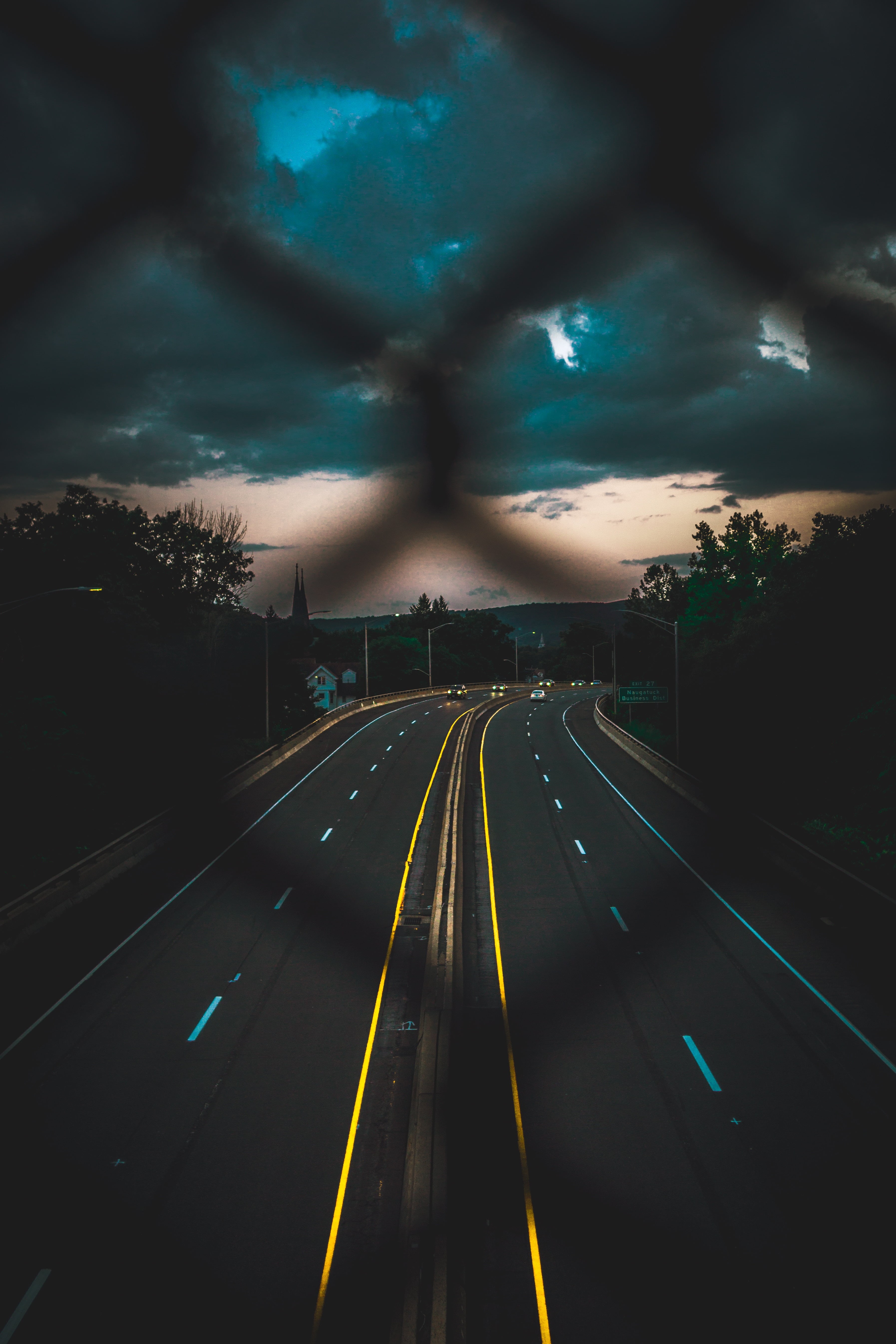city, dark, night, sign, street, cloud - sky, outdoors, power in nature, ominous, nature, road, dramatic sky, dusk, sky, the way forward, motion, symbol, Phone HD Wallpaper