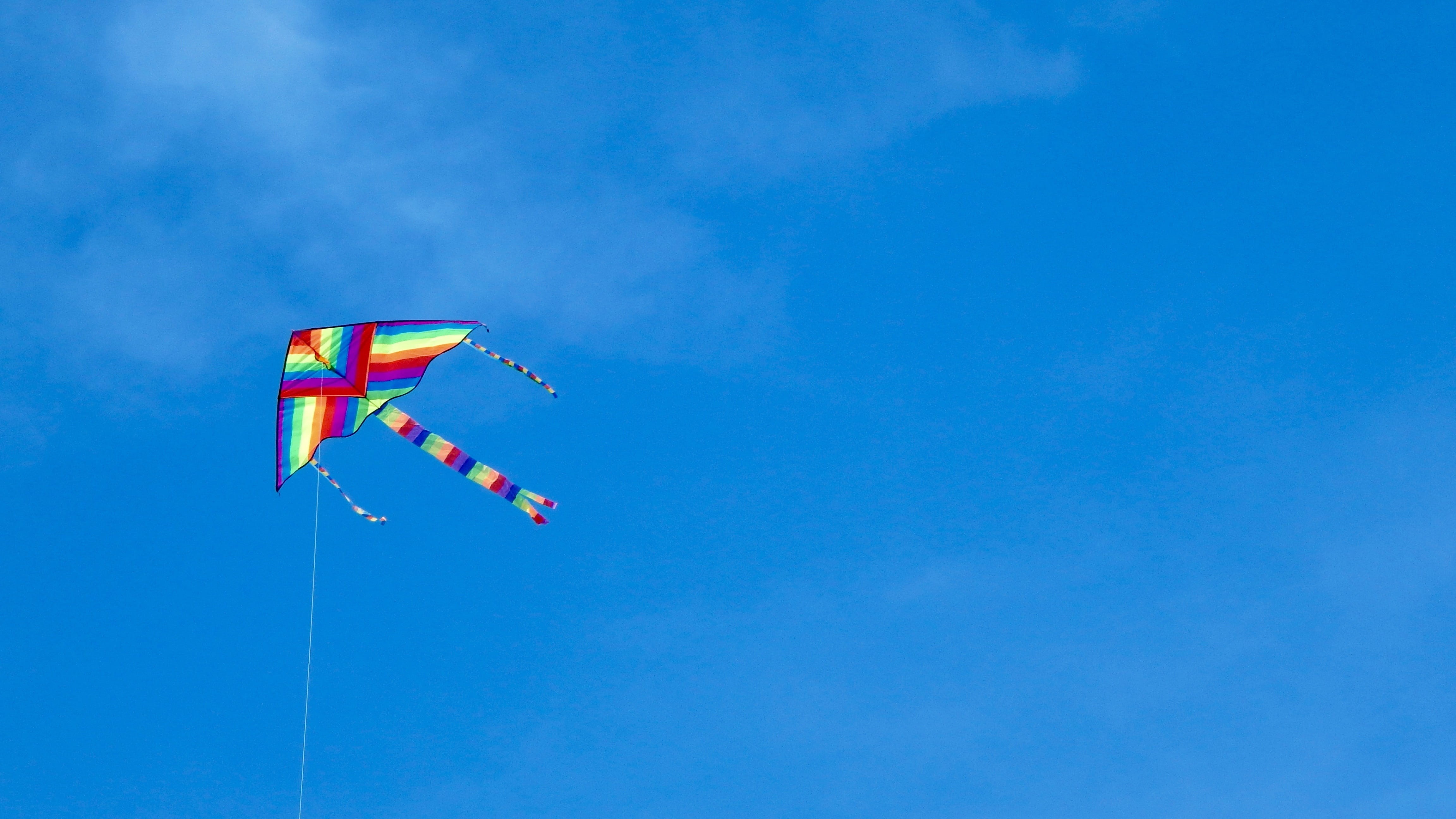 Kite, sunny, sky, blue, Wind, nature, multi colored, 4K, environment, Summer, outdoors, mid-air, Colors, motion, no people, Color, games, hanging, holiday, HD Wallpaper