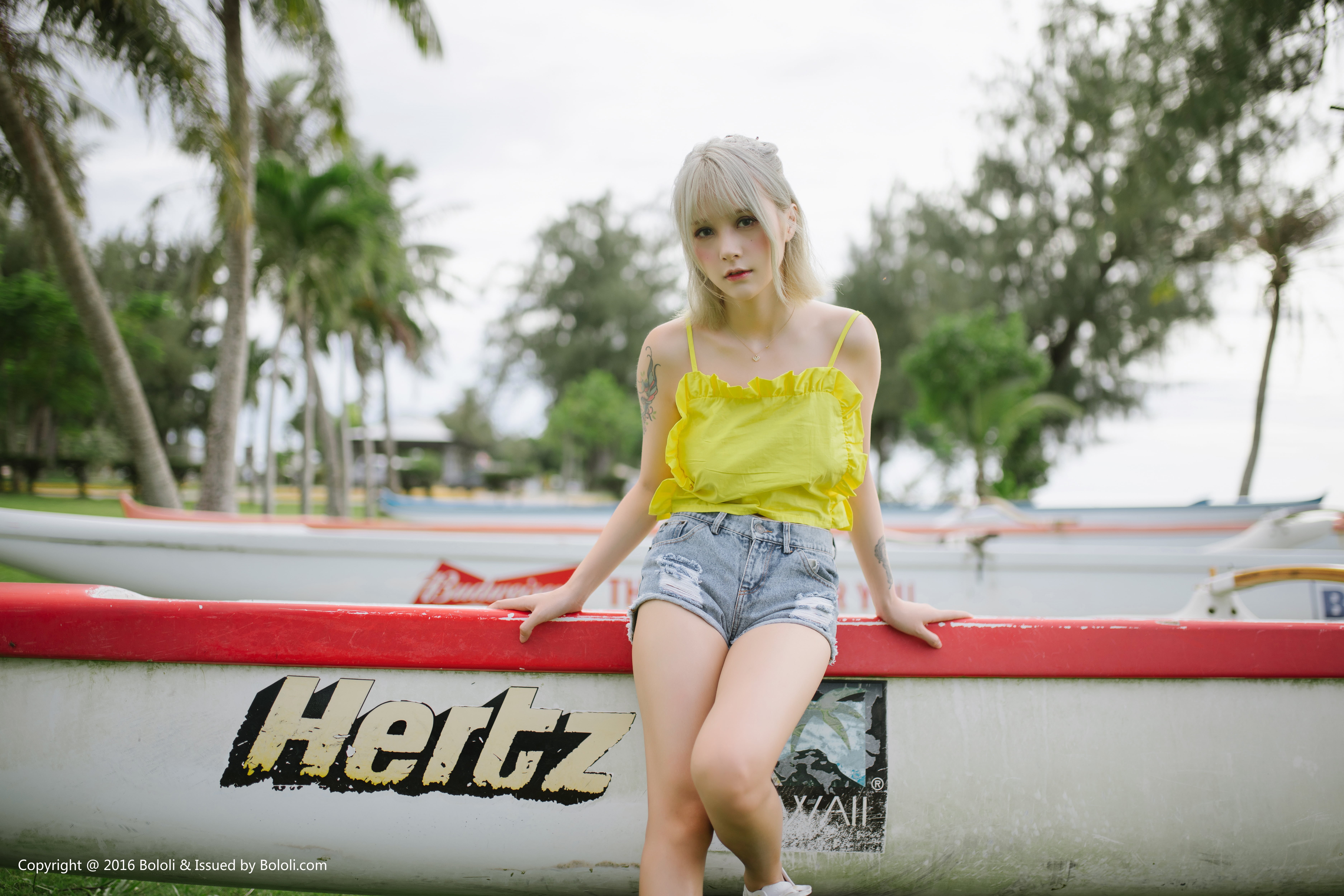 leisure activity, one person, tree, day, blond hair, Asian, hairstyle, sitting, lifestyles, tattoo, model, petite, casual clothing, shorts, jean shorts, HD Wallpaper