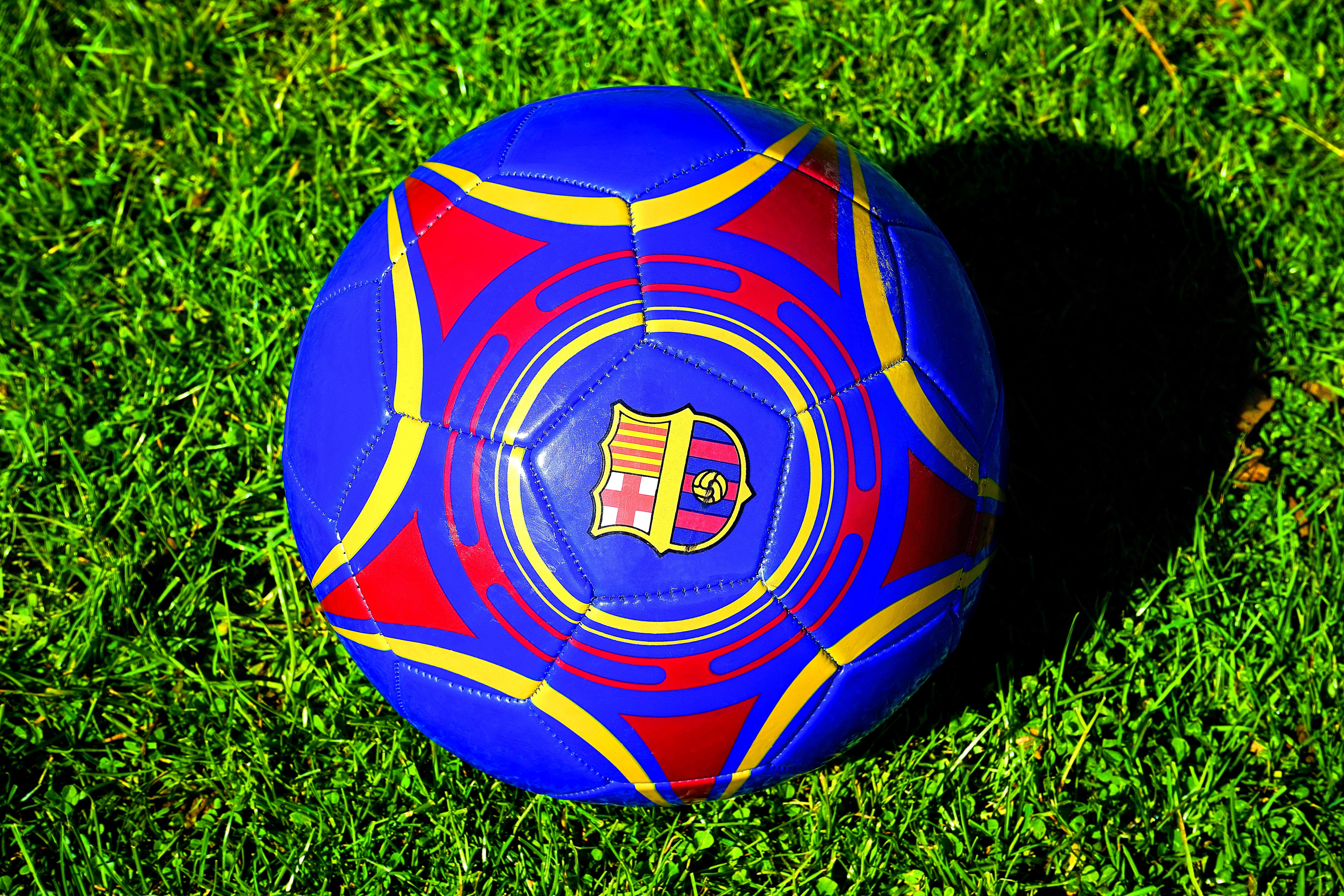 soccerball, red, outdoors, soccer ball, equipment, sunlight, day, sports equipment, land, sphere, no people, plant, nature, multi colored, soccer, shape, HD Wallpaper