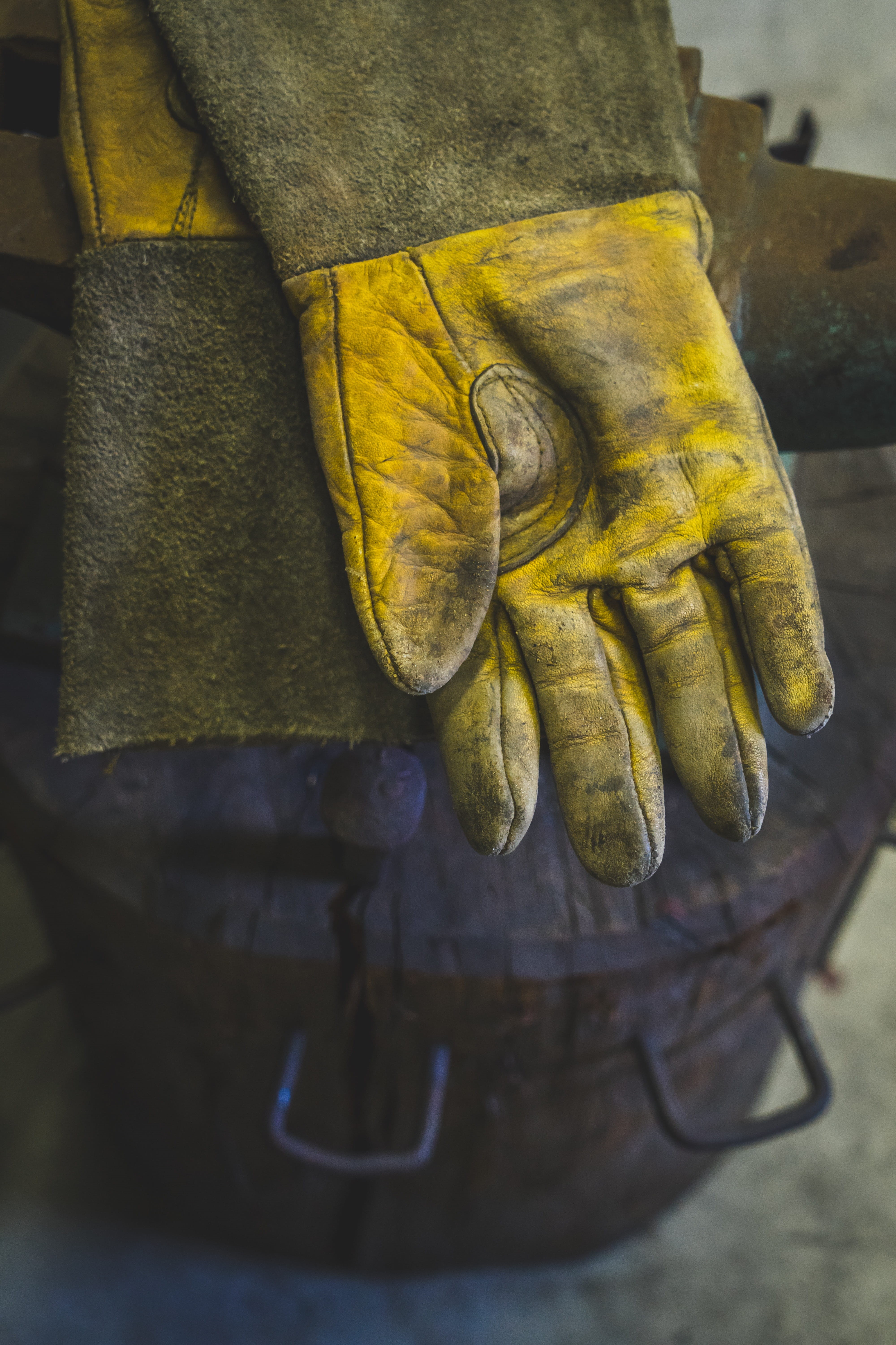 close-up, body part, shop, protective workwear, sculpture, hot, metal, day, steel, iron, retro, antique, representation, no people, manual, industry, yellow, Phone HD Wallpaper