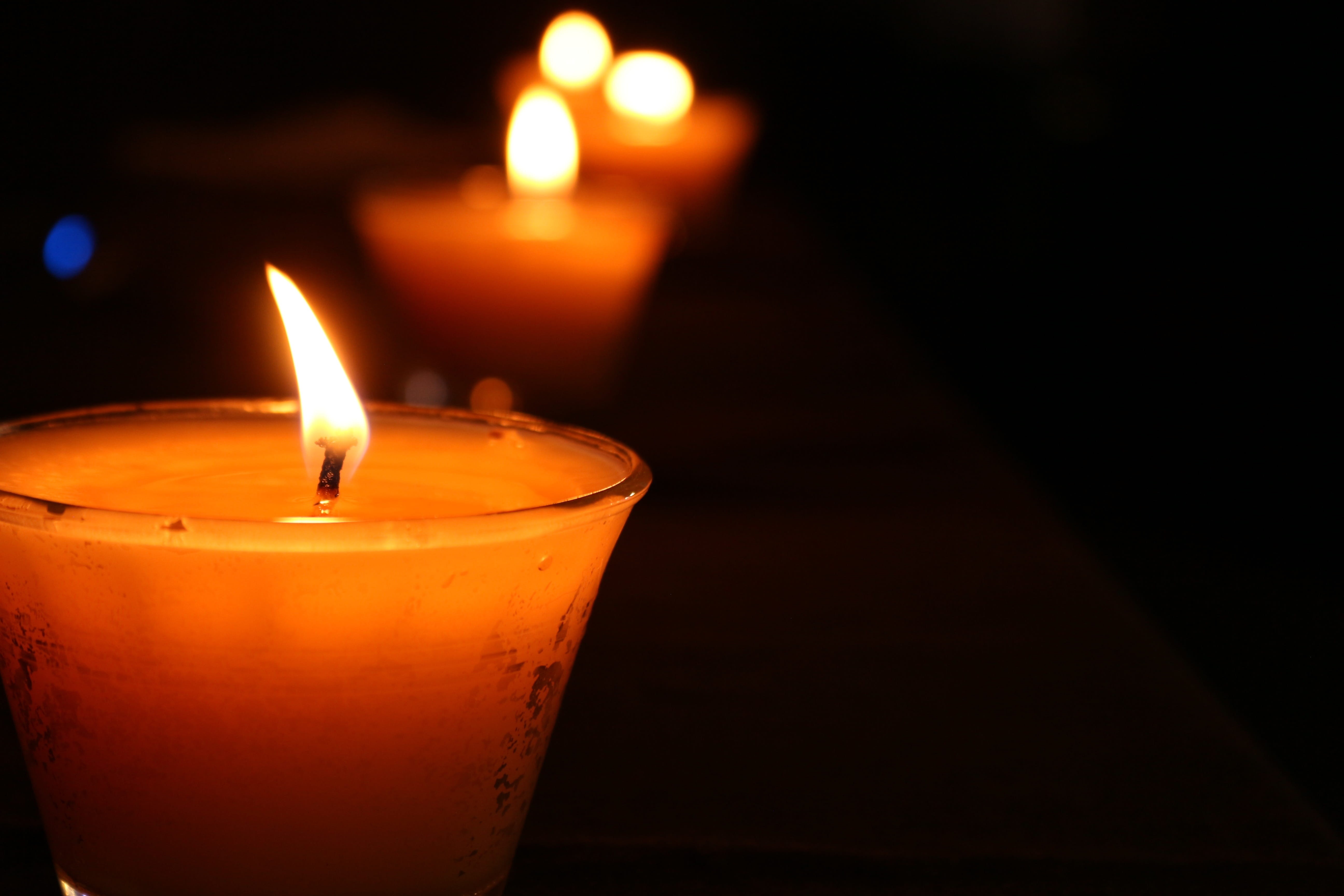 luminosity, indoors, wax, no people, fire, candle, illuminated, death, 5K, orange, copy space, winter, gloomy, orange color, event, nature, light, lighting equipment, HD Wallpaper