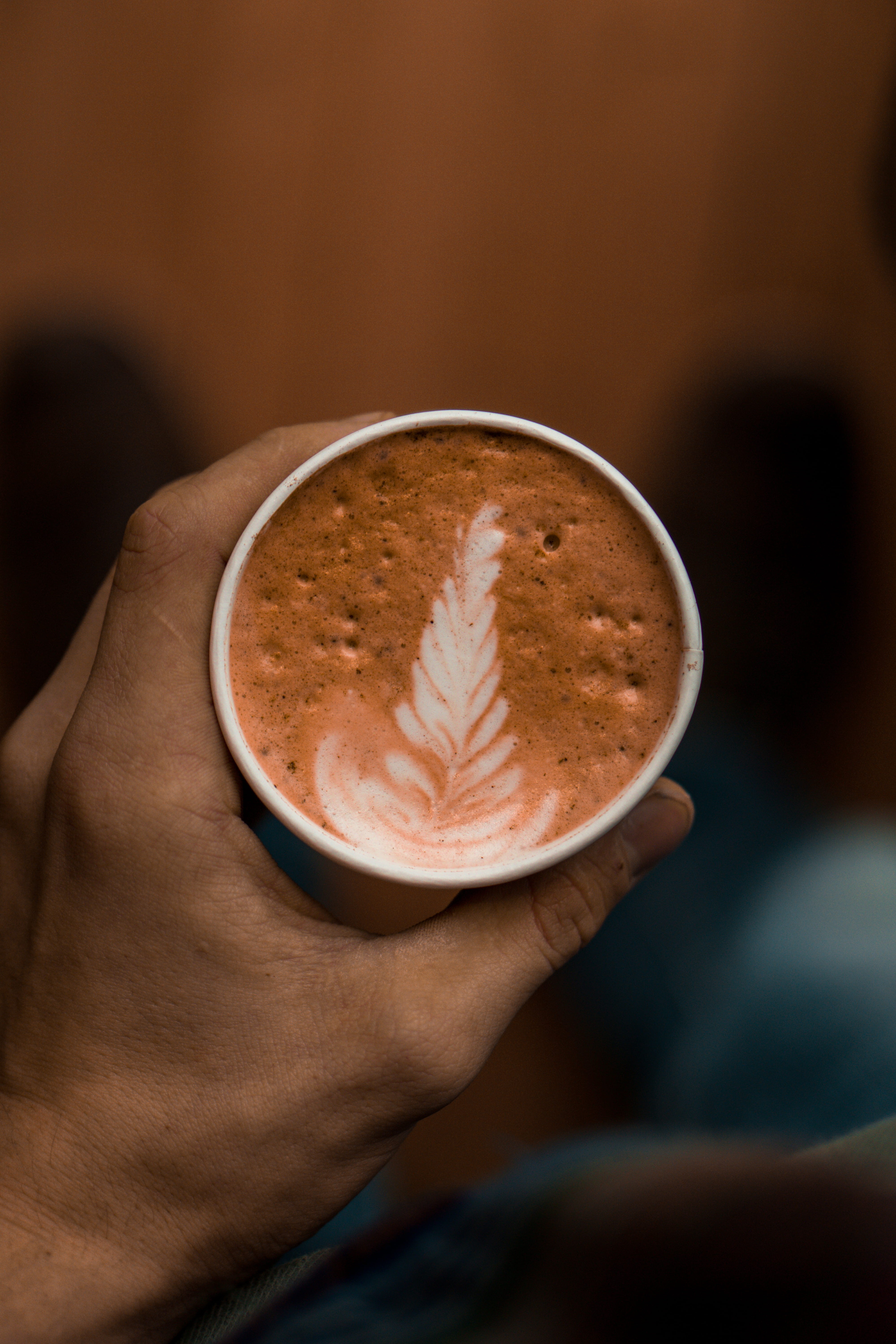 coffee - drink, hot, hot drink, focus on foreground, indoors, cappuccino, food and drink, person, milk, human hand, still life, human body part, brown, Phone HD Wallpaper
