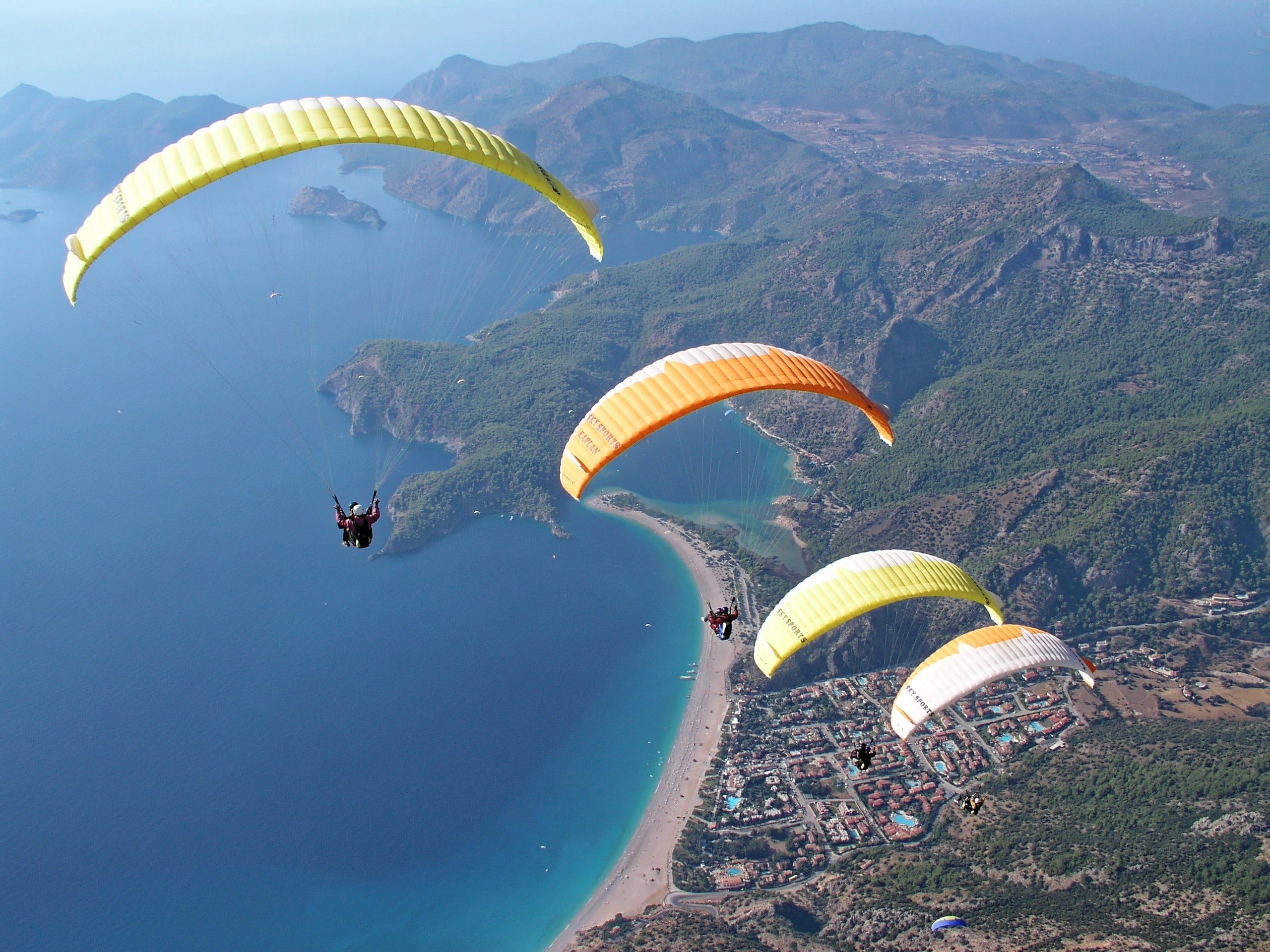 beauty in nature, water, flying, leisure, sea, dom, extreme, environment, adventure, aerial view, recreational Pursuit, scenics - nature, blue, aerial, HD Wallpaper