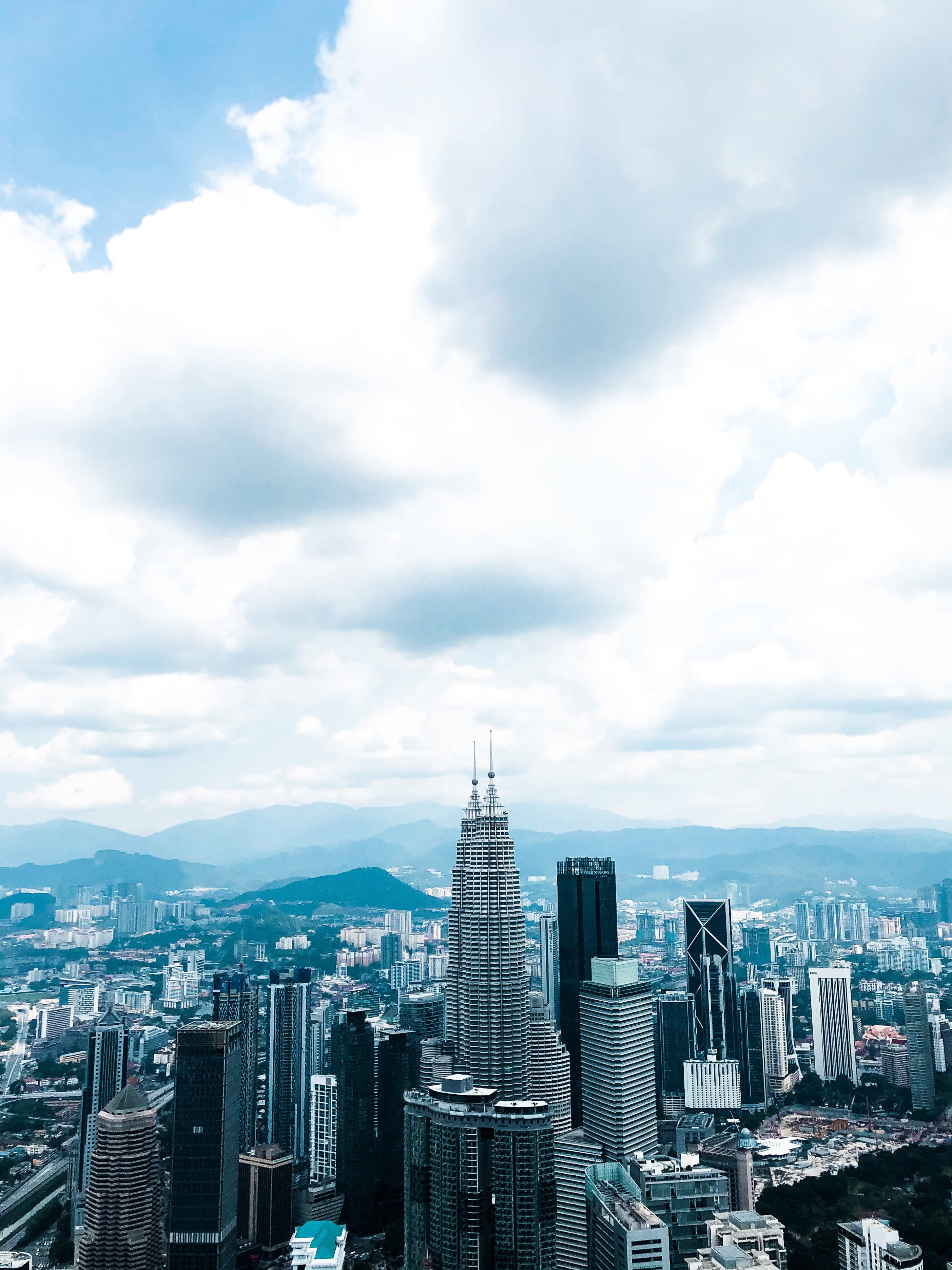 landscape, angle, outdoors, cityscape, spire, settlement, nature, no people, town, tower, travel destinations, skyscraper, sky, built structure, kuala lumpur, Phone HD Wallpaper
