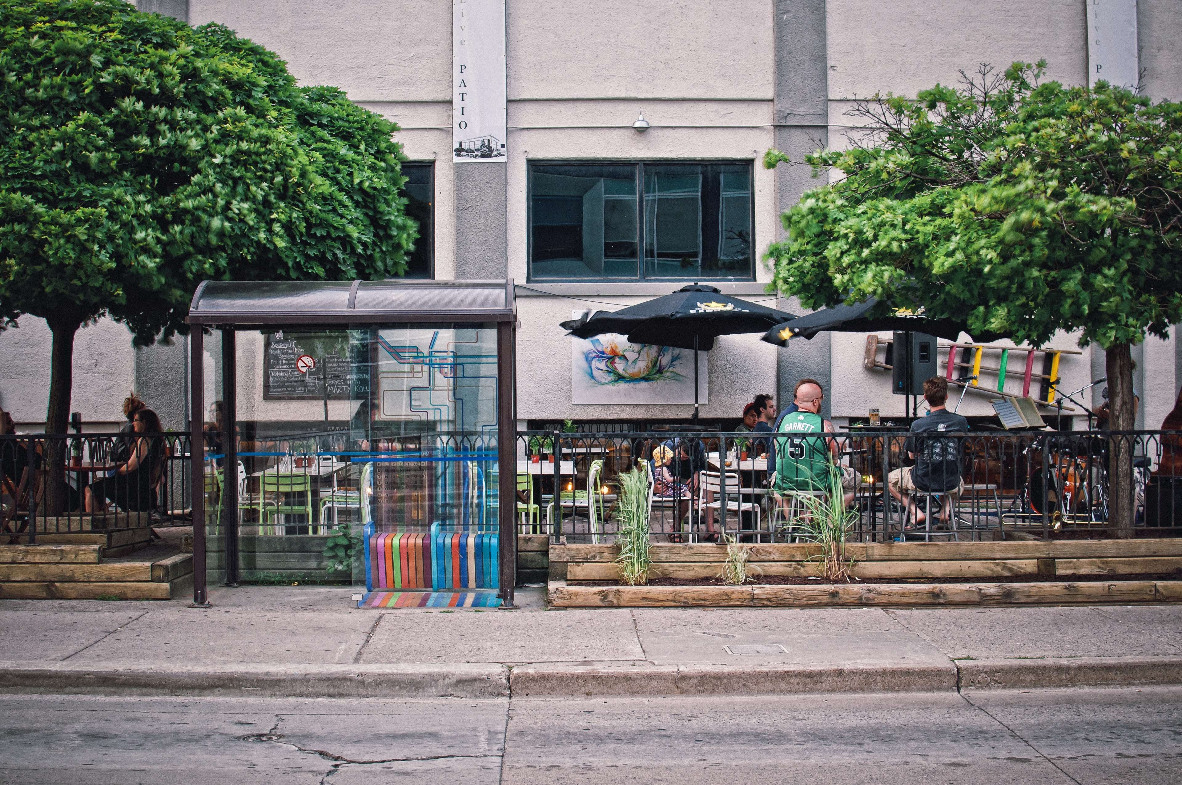 group of people, shelter, sidewalk, garden, building, people, outdoors, real people, commerce, man, men, tree, patio, daylight, chairs, seating, day, relaxation, HD Wallpaper