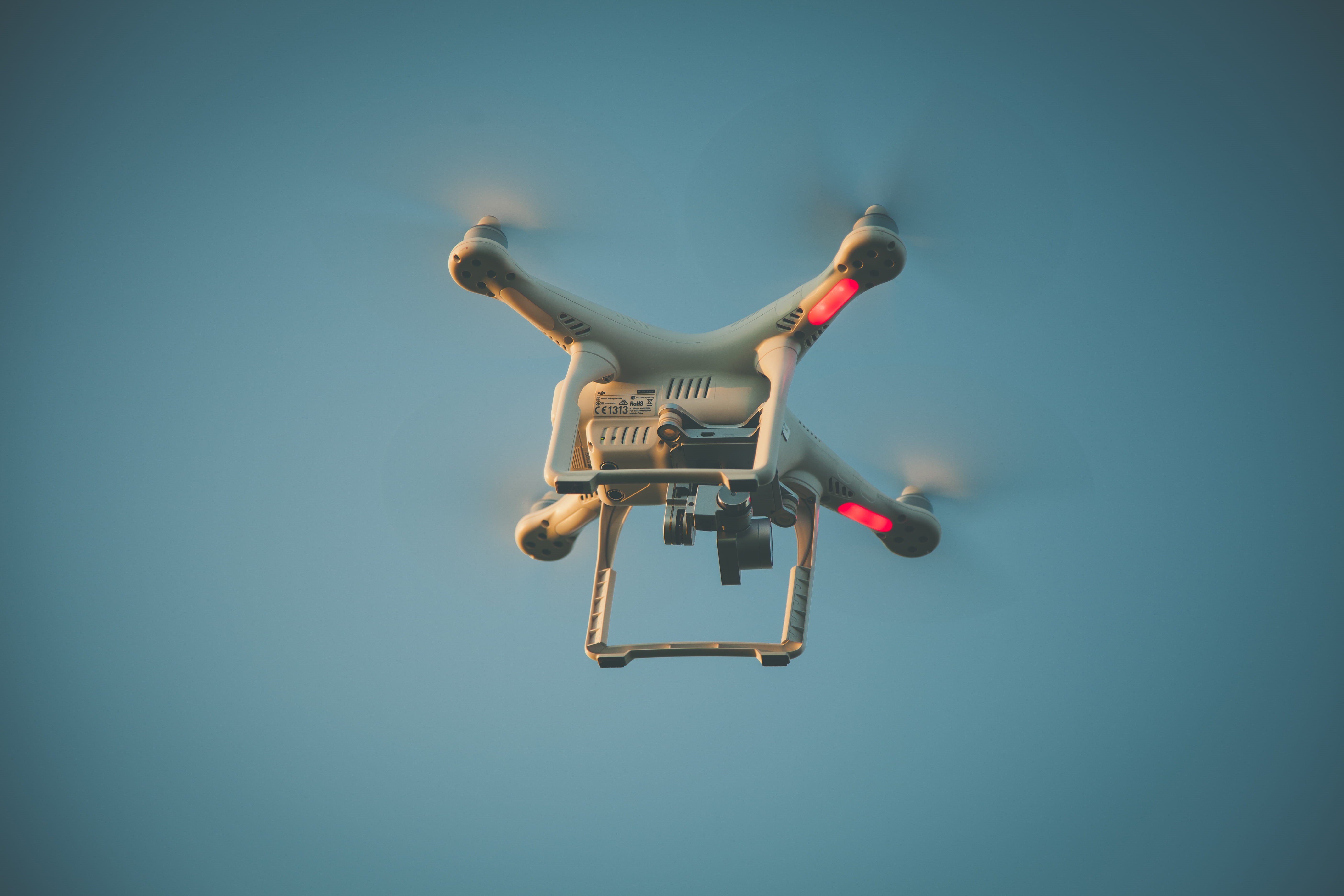 action, flying, dji, 5K, wireless technology, mid-air, aircraft, eyeview, fun, quadcopter, blue, people, nature, blue background, colored background, white, HD Wallpaper