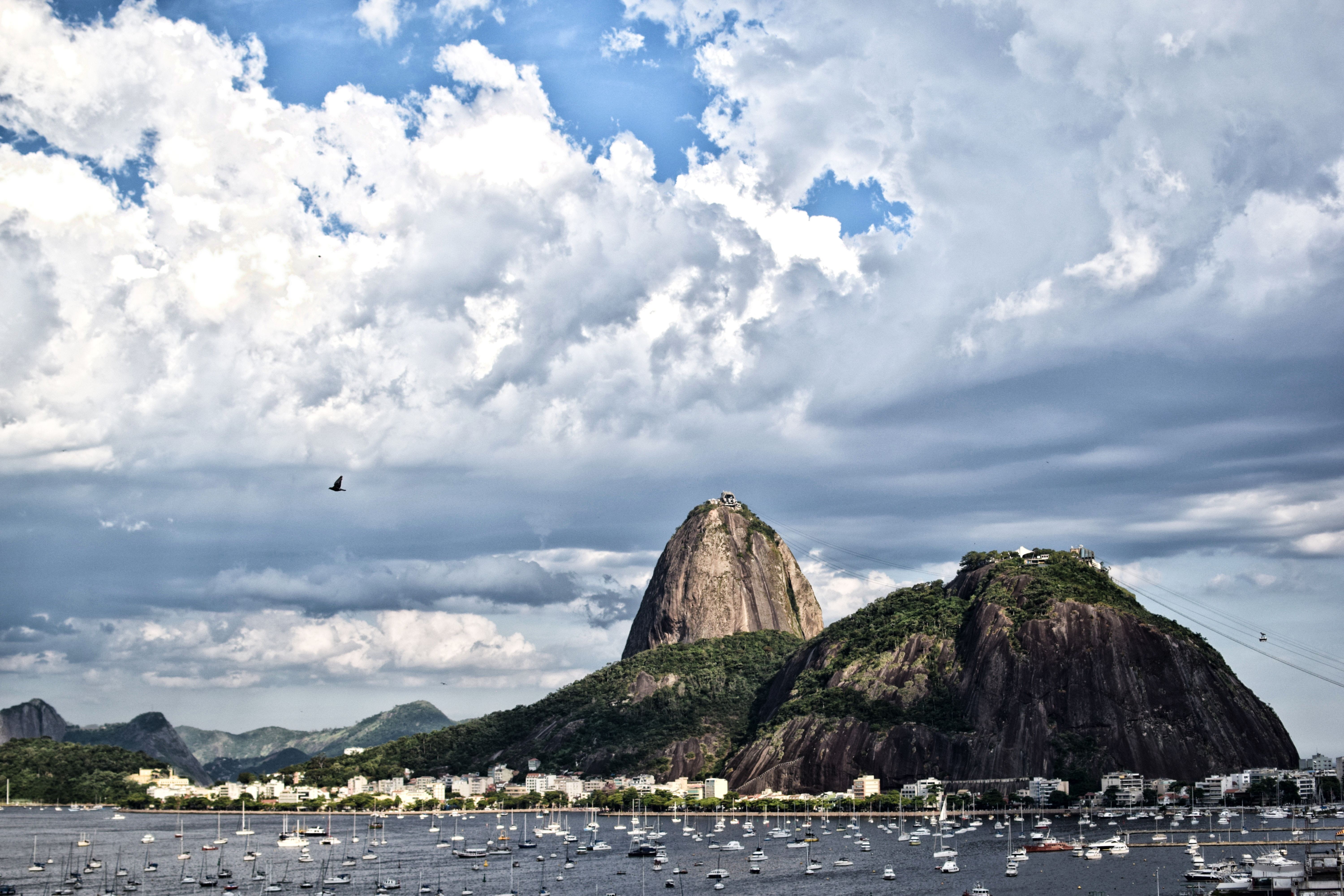 water, rock - object, bay, clouds, rock, mountains, beauty in nature, 5K, brazil, beach, cloud - sky, sea, bird, transportation, waterfront, sky, nautical vessel, HD Wallpaper