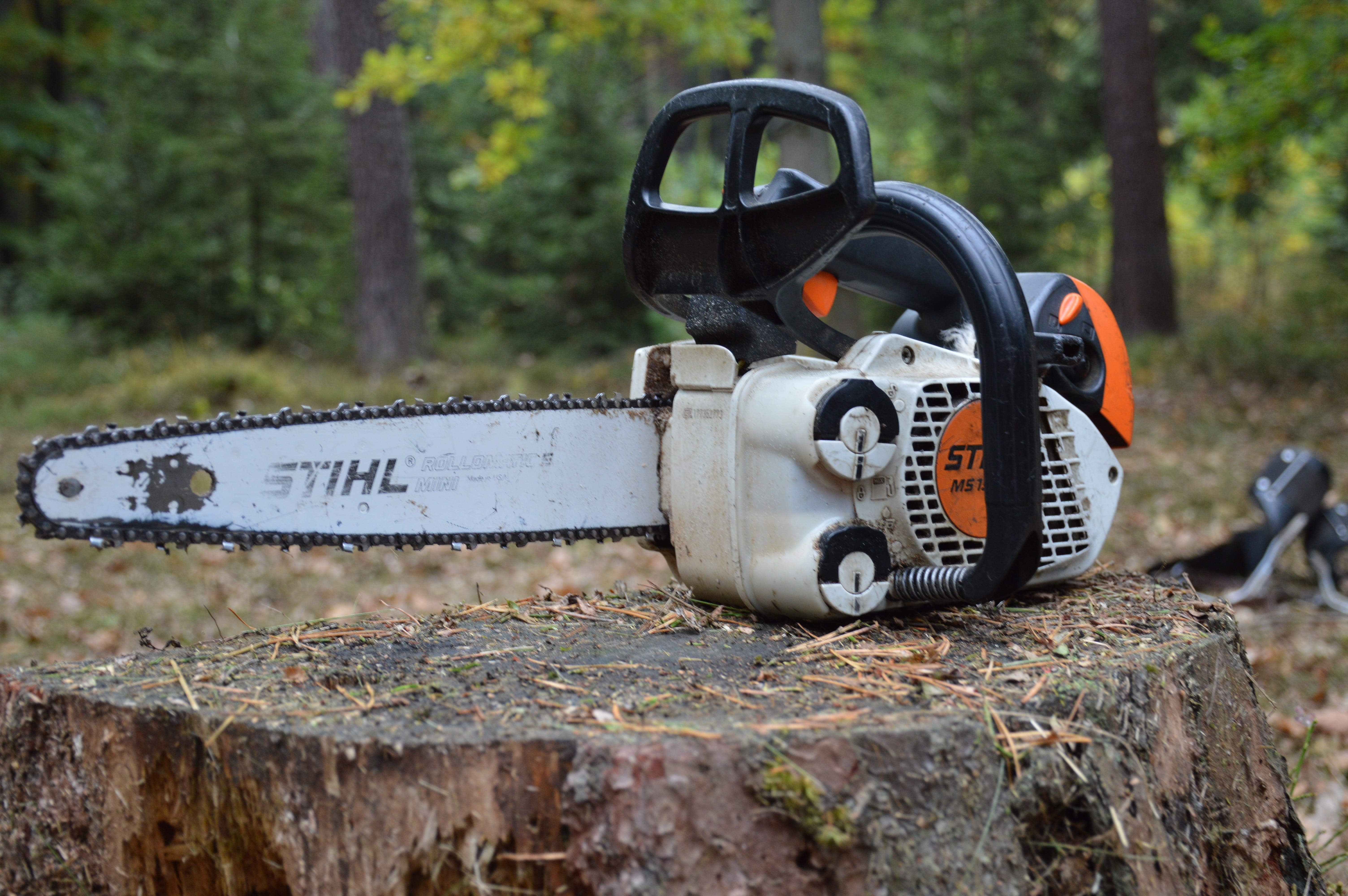 chainsaw, technology, text, western script, day, outdoors, transportation, equipment, land, wood carving, trimming trees, machinery, tree, selective focus, HD Wallpaper