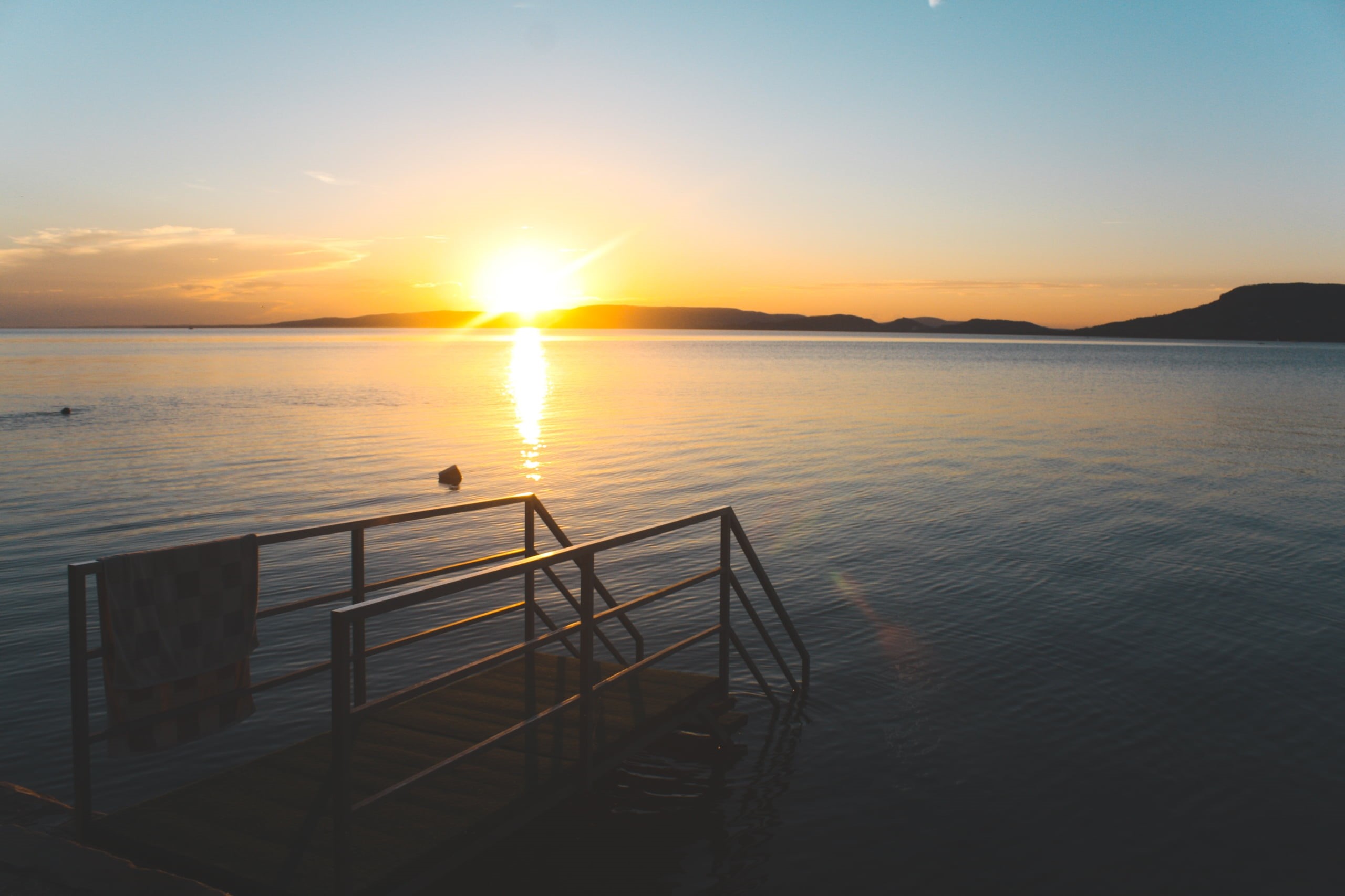 water, cloud - sky, orange color, sky, brown, beauty in nature, outdoors, Lake Balaton, sun, no people, nature, mountains, tranquility, non-urban scene, HD Wallpaper