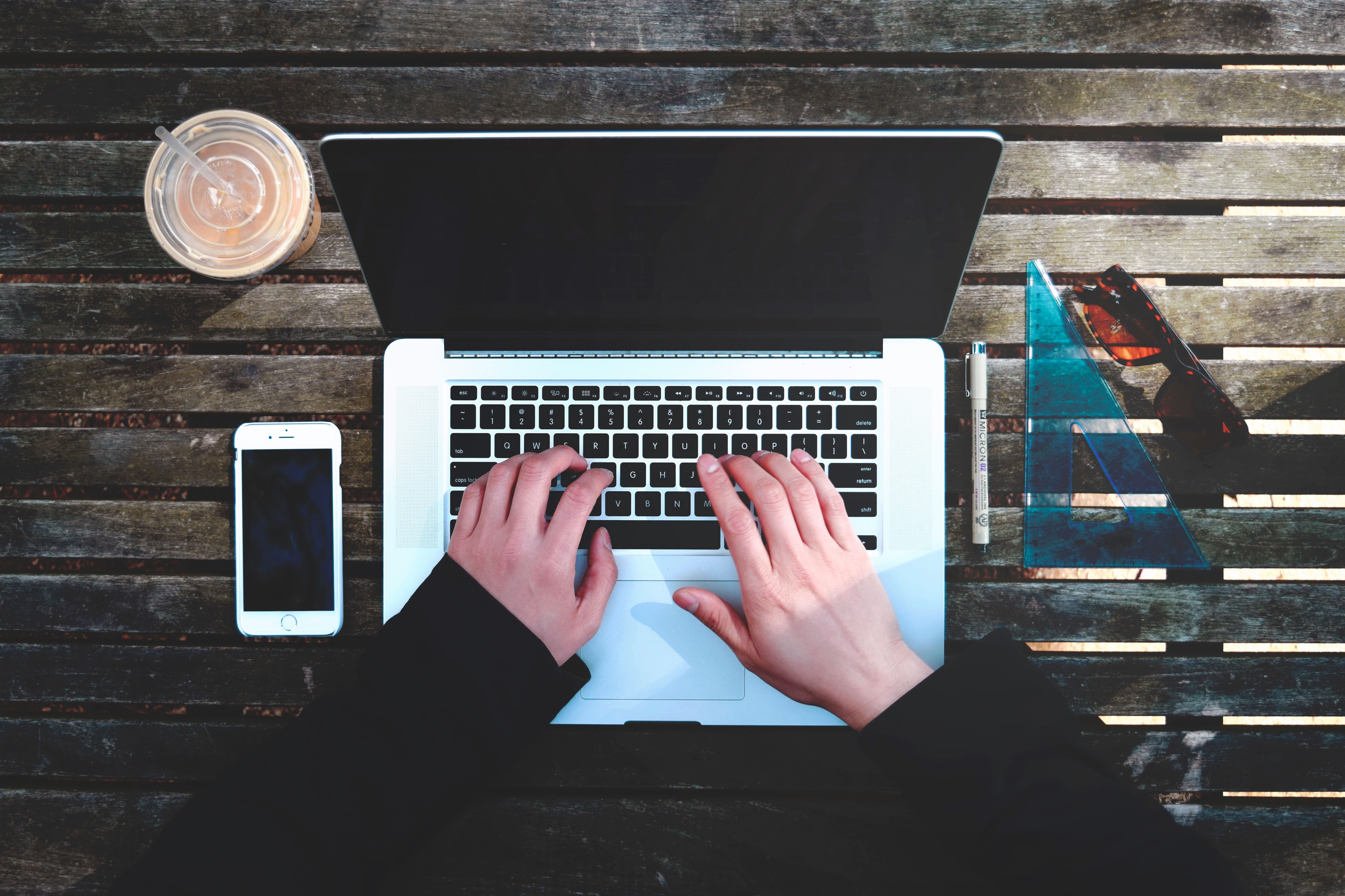 connection, drink, human body part, macbook, laptop, browser, leisure activity, portable information device, typing, finger, one person, table, wireless technology, HD Wallpaper