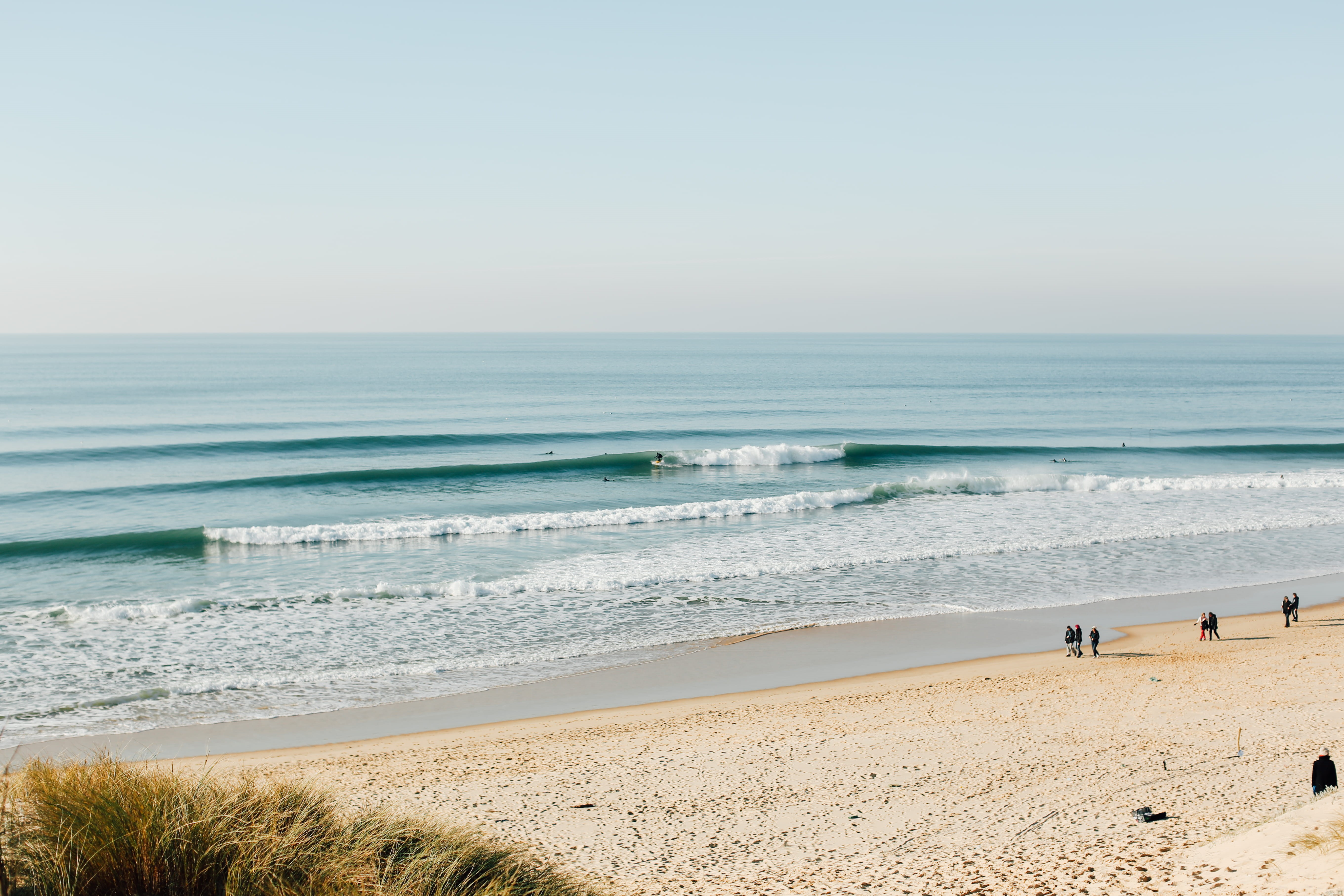 adventure, coast, daytime, day, motion, beauty in nature, lineup, tranquility, clear sky, sea waves, human, scenics - nature, person, outdoors, beach, non-urban scene, HD Wallpaper