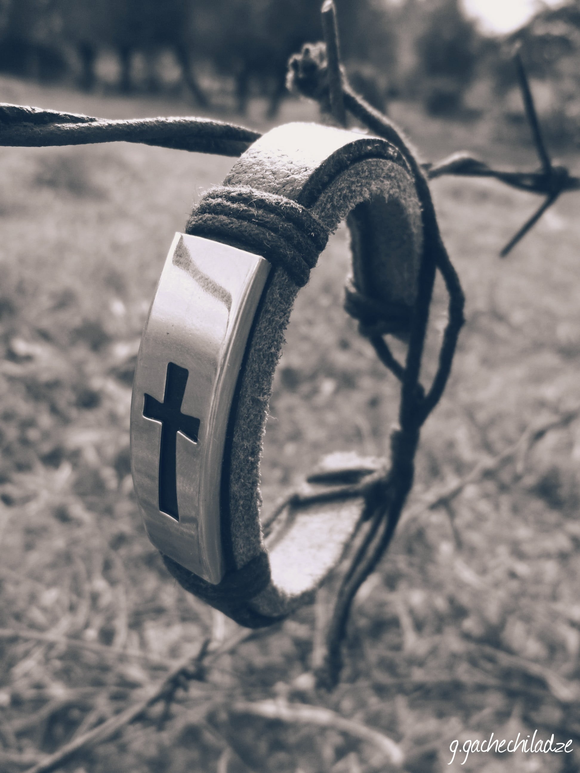 bracelets, no people, macro, sports equipment, day, equipment, nature, single object, leather, sunlight, safety, technology, crucifix, focus on foreground, Phone HD Wallpaper
