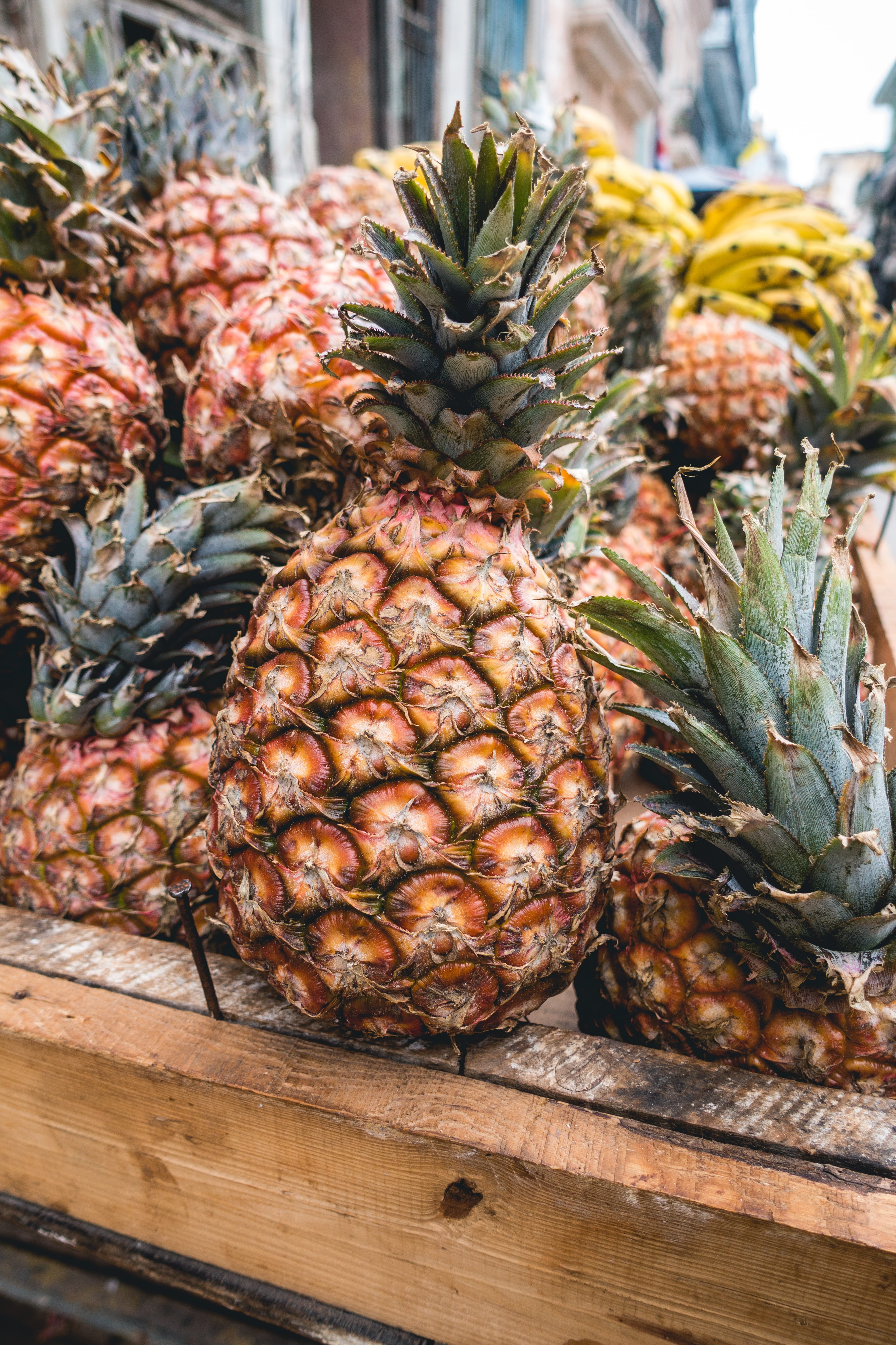 fruit, sweet Food, yellow, still life, 5K, summer, focus on foreground, outside, retail, healthy Eating, market, freshness, no people, wood - material, Phone HD Wallpaper