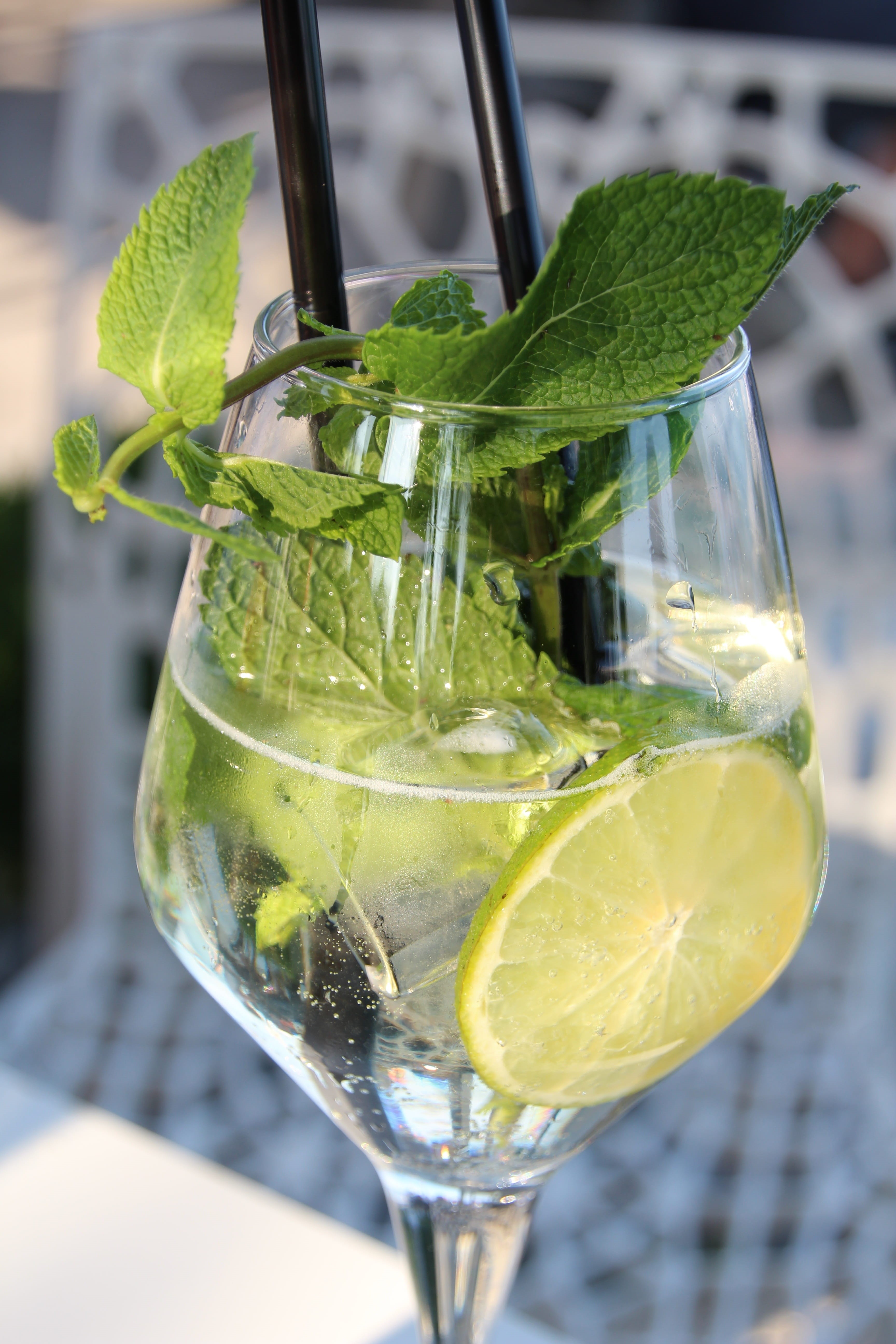 Cocktail, Lime, garnish, cold - Temperature, glass, close-up, food and drink, ice, glass - Material, refreshment, citrus Fruit, herb, fruit, juice, lemon, Phone HD Wallpaper