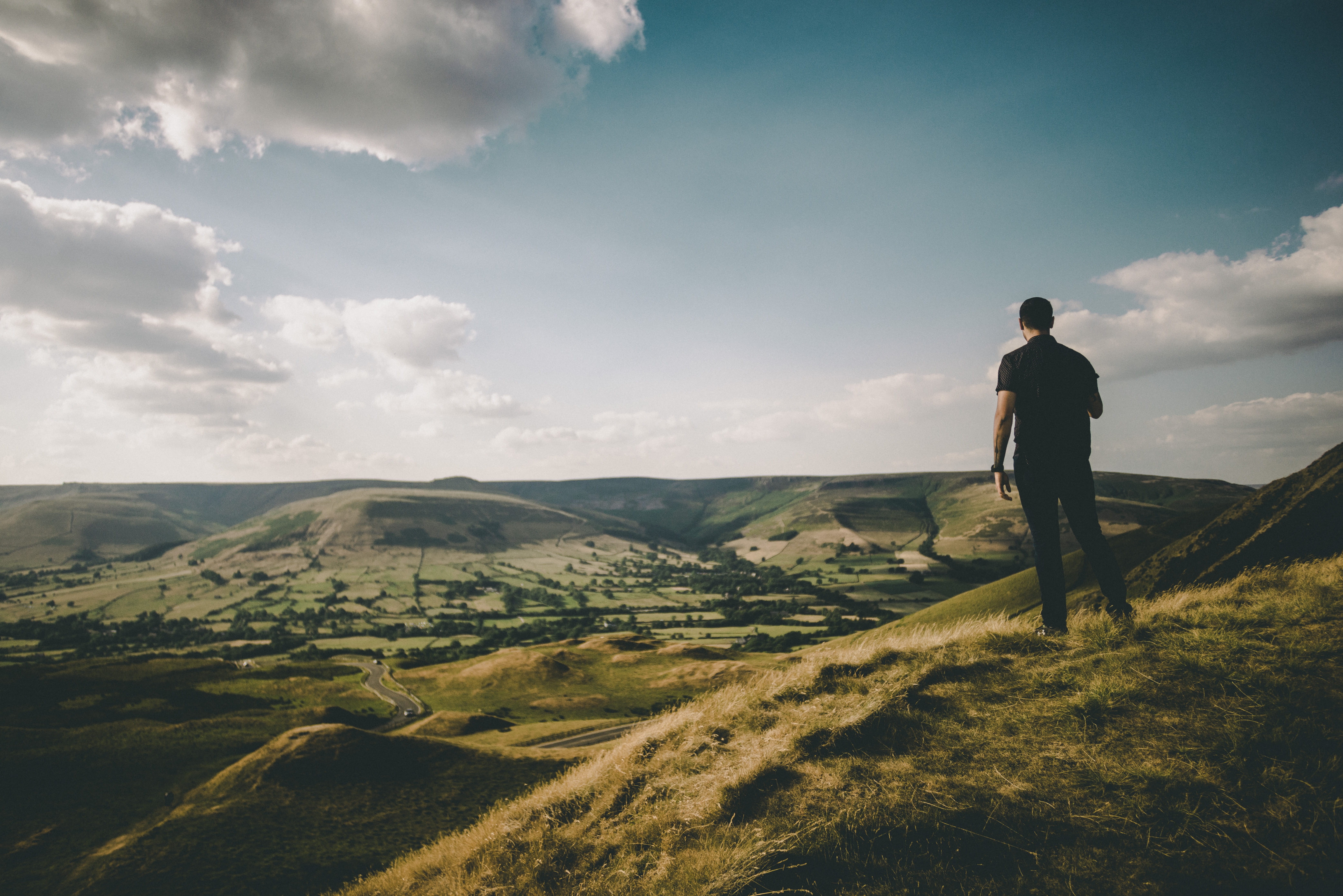 looking at view, landscape, daytime, tranquil scene, sky, hill, rear view, tranquility, ridge, brushfield, mountain, leisure activity, nature, man, person, HD Wallpaper