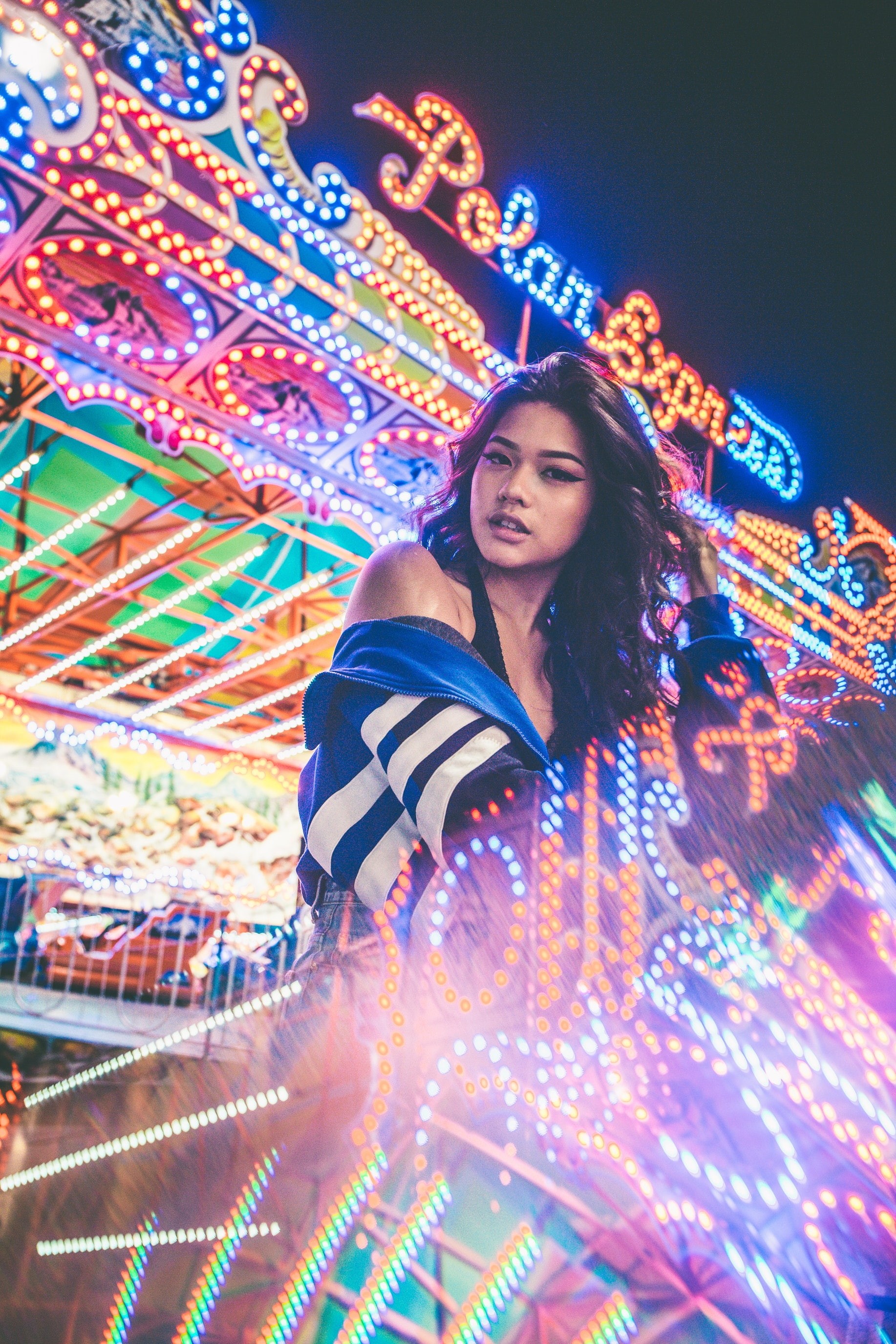 beautiful woman, illuminated, waist up, multi colored, adult, warm colors, beauty, hairstyle, amusement park, smiling, women, night, arts culture and entertainment, Phone HD Wallpaper