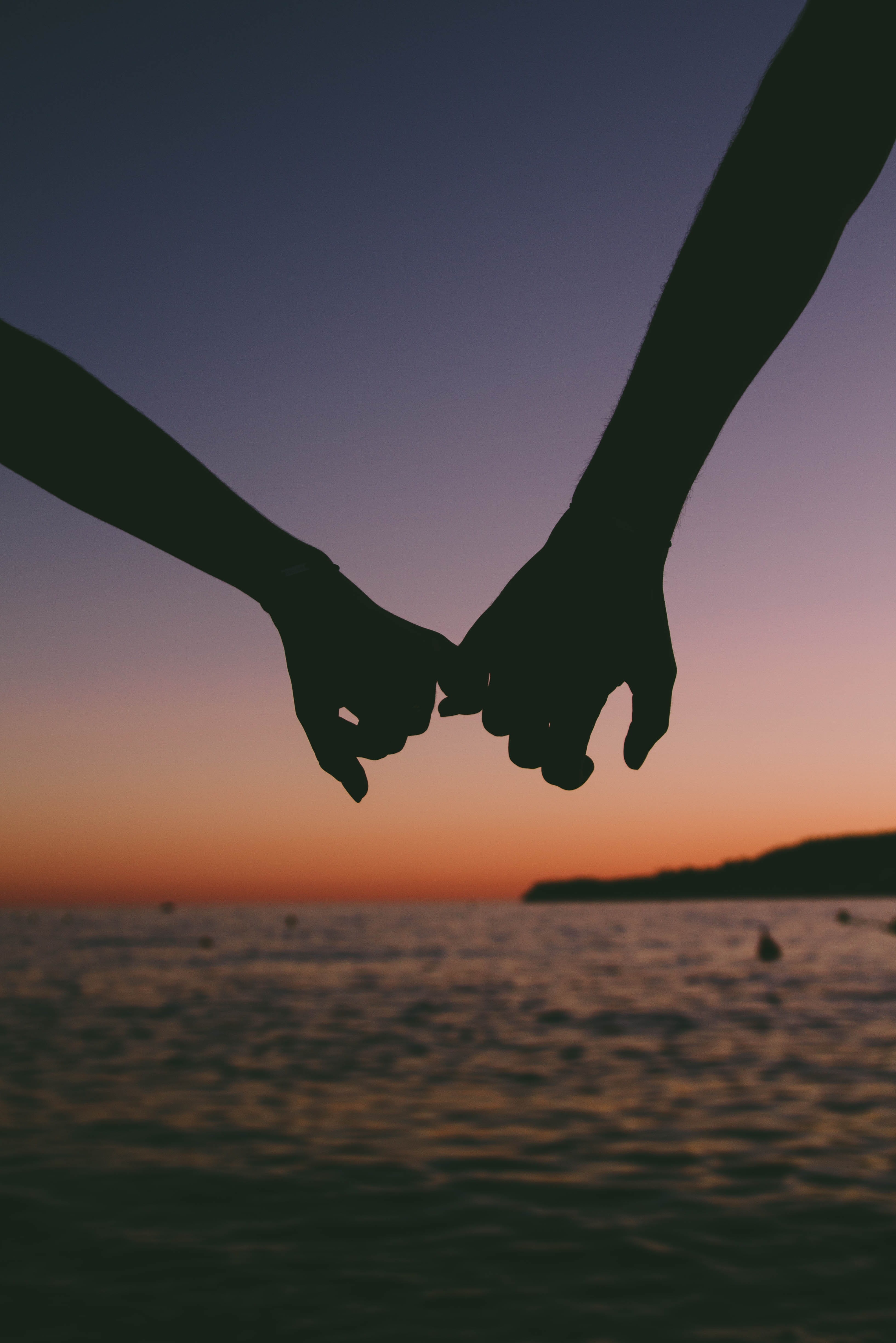 ombre, outdoors, leisure activity, tranquil scene, sky, seashore, evening, holding, hands, mid-air, ocean, backlit, togetherness, silhouette, clear sky, Phone HD Wallpaper
