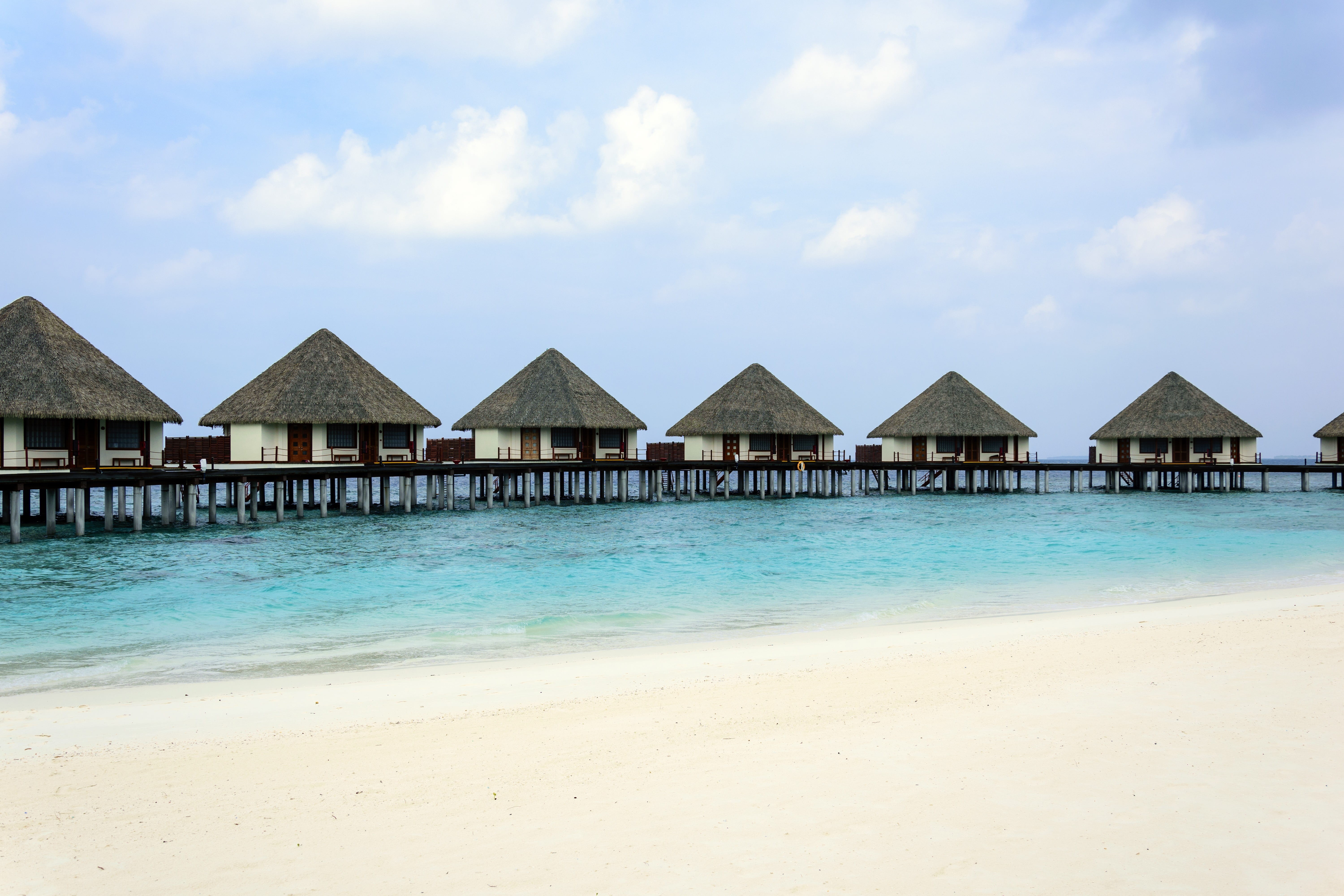 house, stilt house, water, roof, island, 5K, built structure, residential district, cloud - sky, no people, maldives, turquoise, building exterior, color, HD Wallpaper