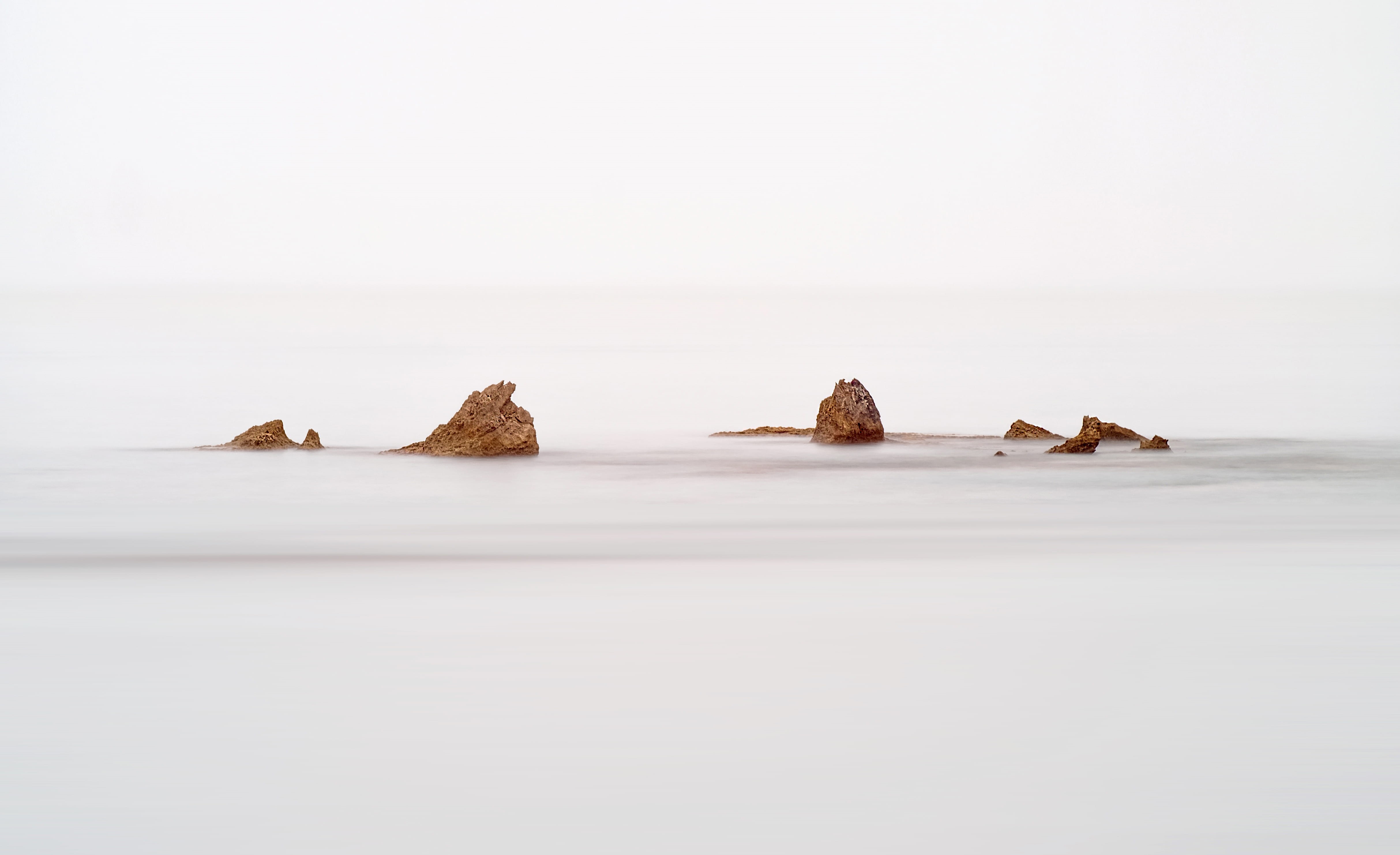 in a row, sea, animal wildlife, outdoors, ocean, studio shot, day, rock, no people, longexpo, simplicity, minimalism, movement, tranquility, background, HD Wallpaper