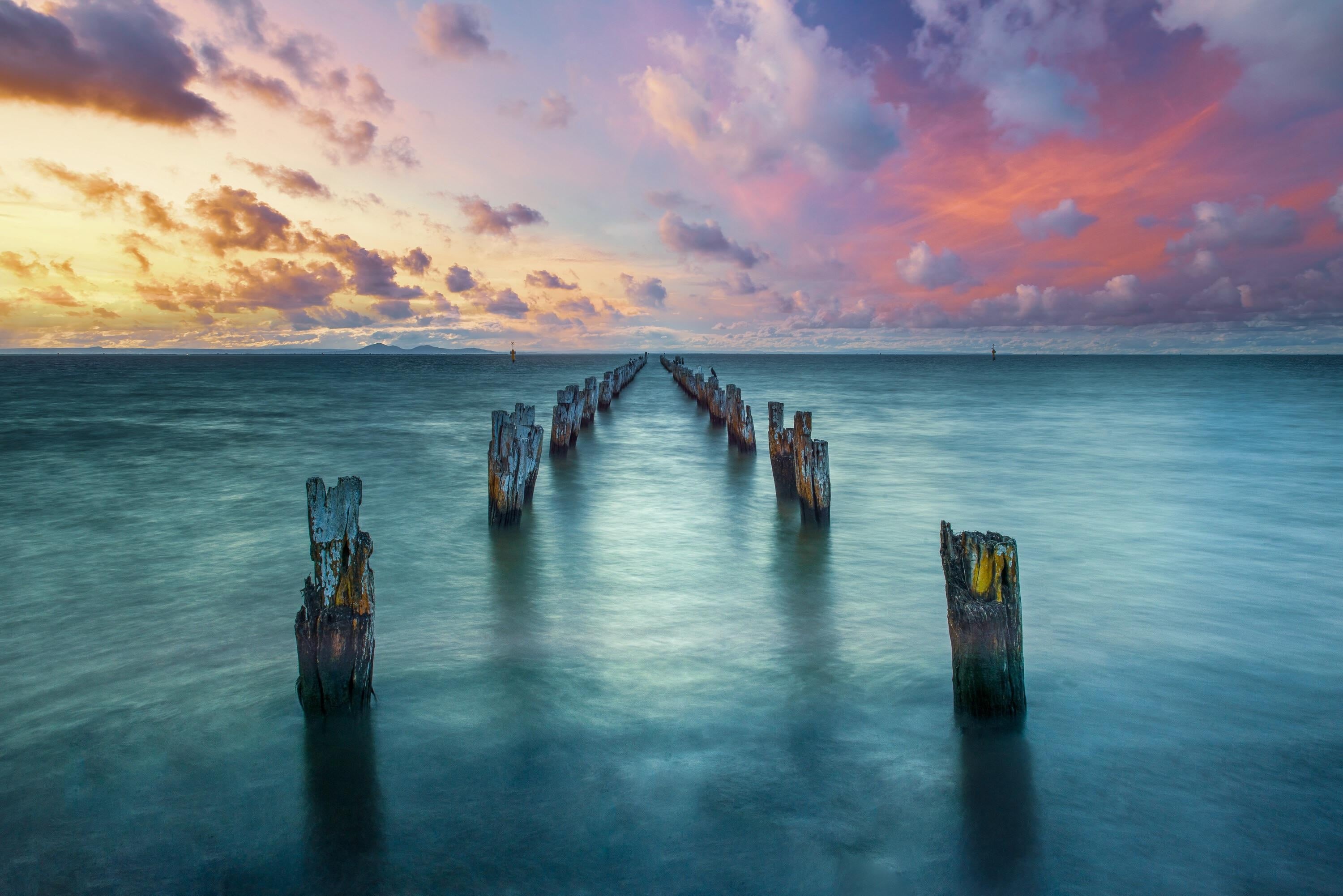 sunset, body, wood - material, wooden post, sky, idyllic, jetty, beauty in nature, water, reflection, sea, 2K, landscape, nature, post, horizon over water, HD Wallpaper