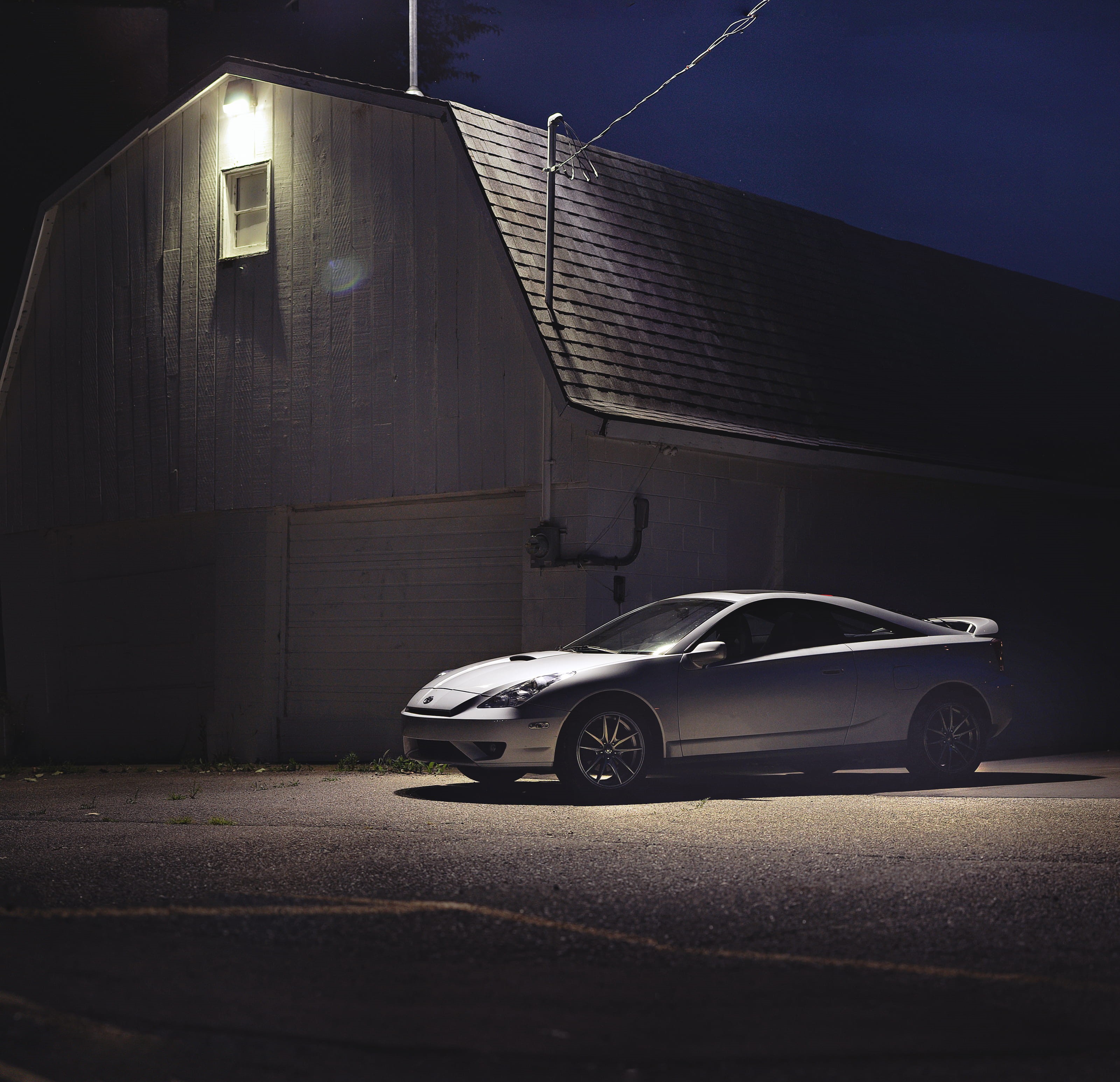 built structure, motor vehicle, street, city, gravel, barn light, toyota, road, no people, car, architecture, night, building, silver, illuminated, building exterior, HD Wallpaper