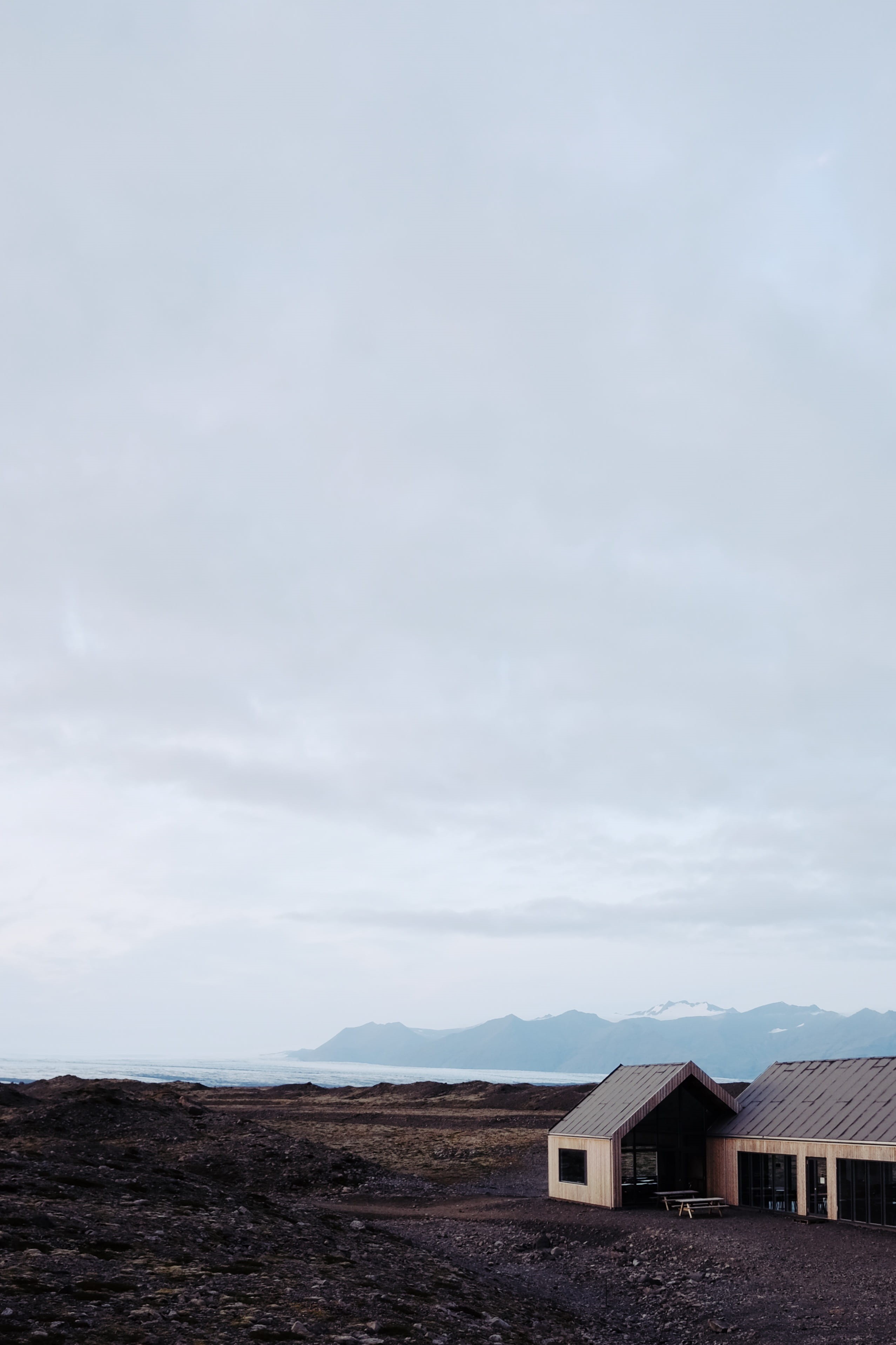 cloud, 2K, mist, day, sky, ice, beach, track, roof, building exterior, nature, body, landscape, wooden, fog, gray, cloud - sky, island, cabin, stone, cloudy, Phone HD Wallpaper