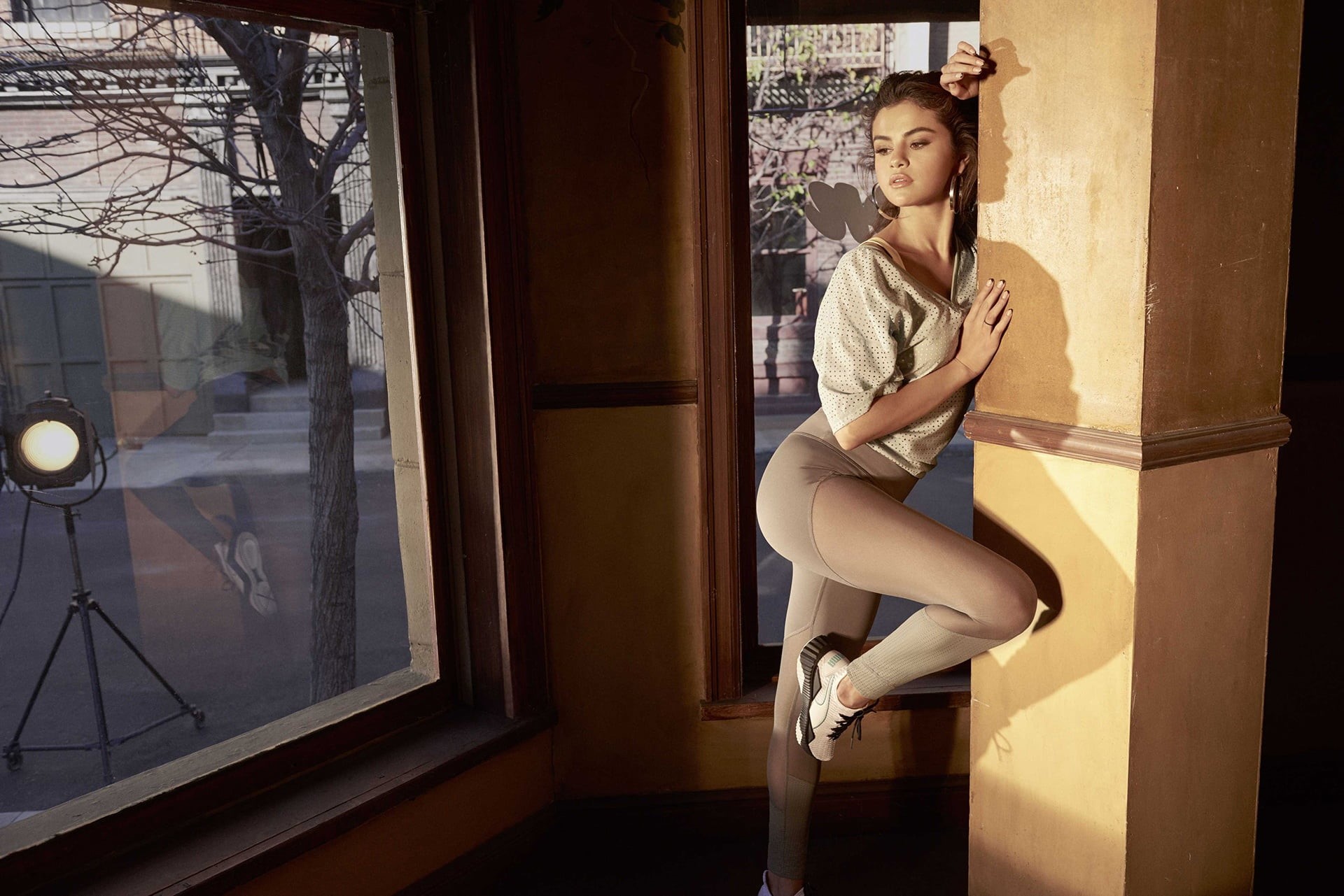 beautiful woman, leisure activity, Selena Gomez, young adult, women, door, architecture, real people, contemplation, young women, window, day, sitting, HD Wallpaper