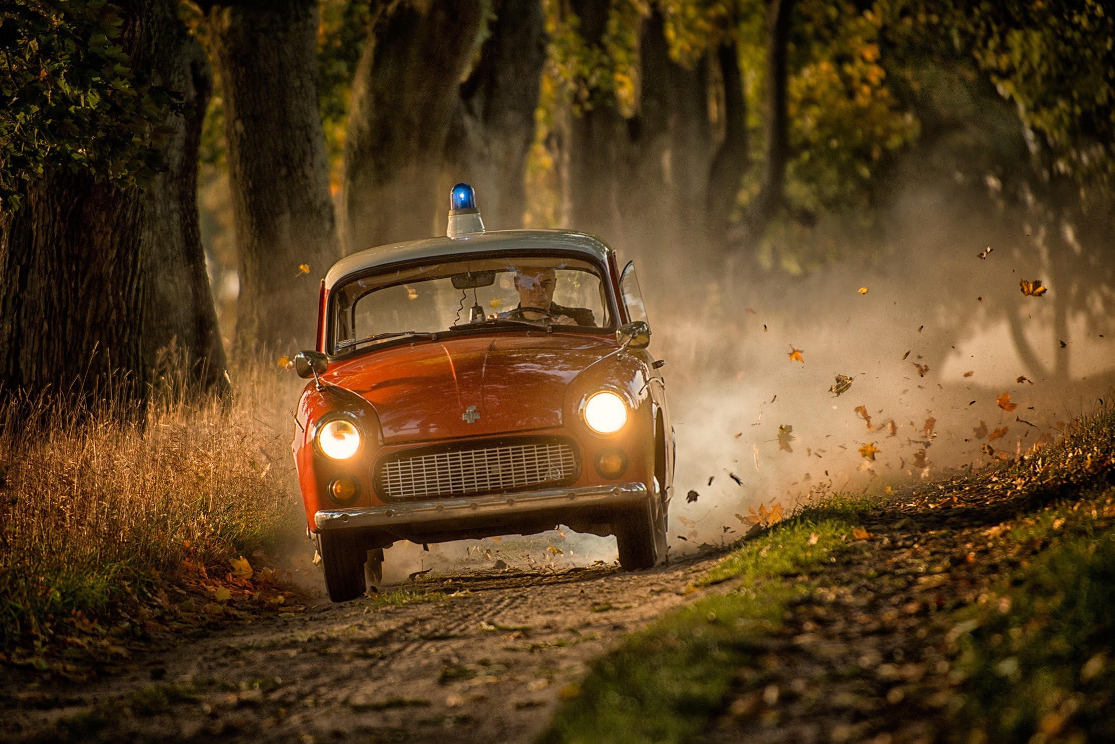 men, police, Syrena 105, driving, police cars, 1080P, car, trees, red cars, humor, fall, dust, vehicle, dirt road, road, fallen leaves, HD Wallpaper