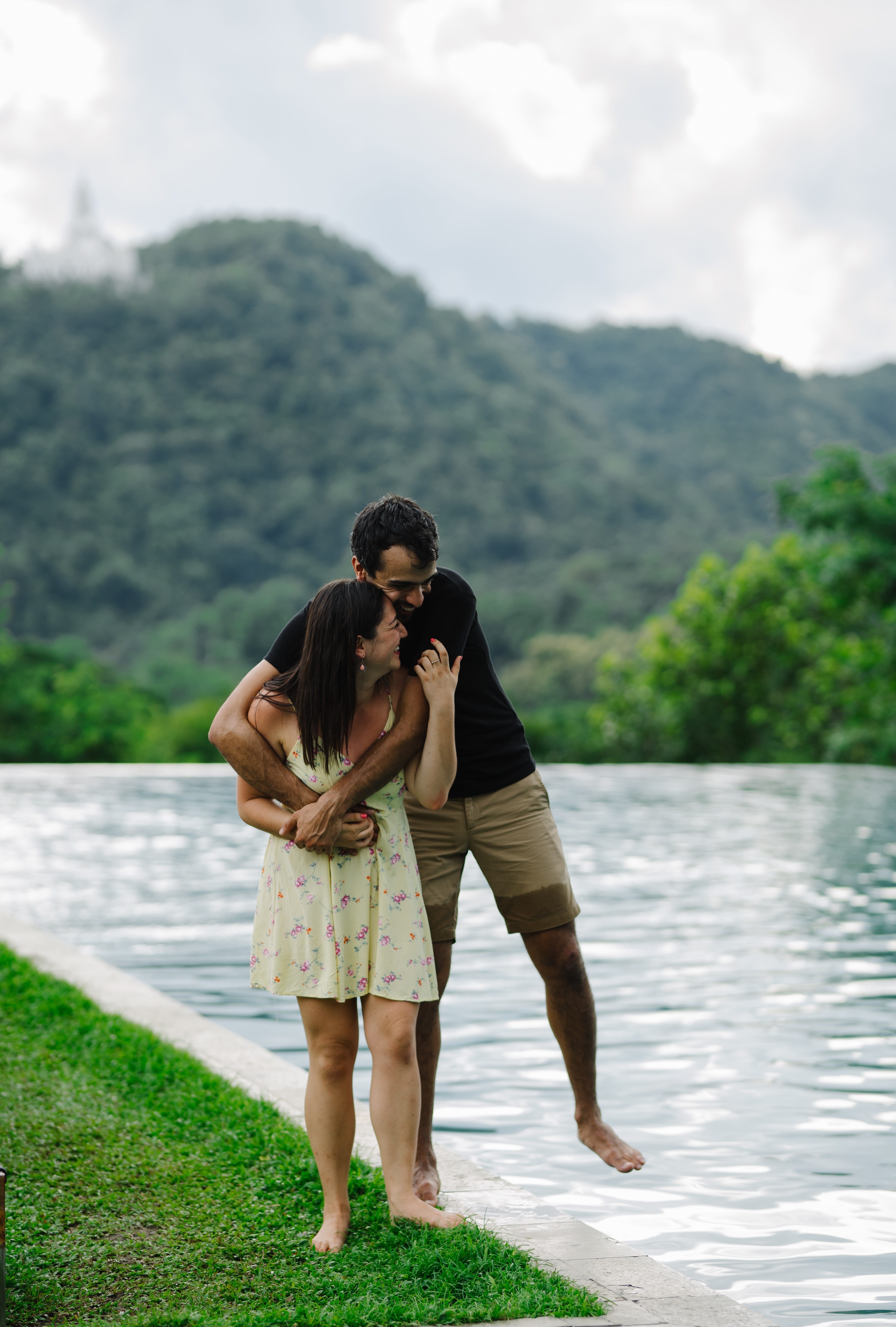 couple - relationship, traveling couples, standing, day, love, lake, nature, couples, resort, two people, togetherness, short woman, outdoors, tall male, Phone HD Wallpaper