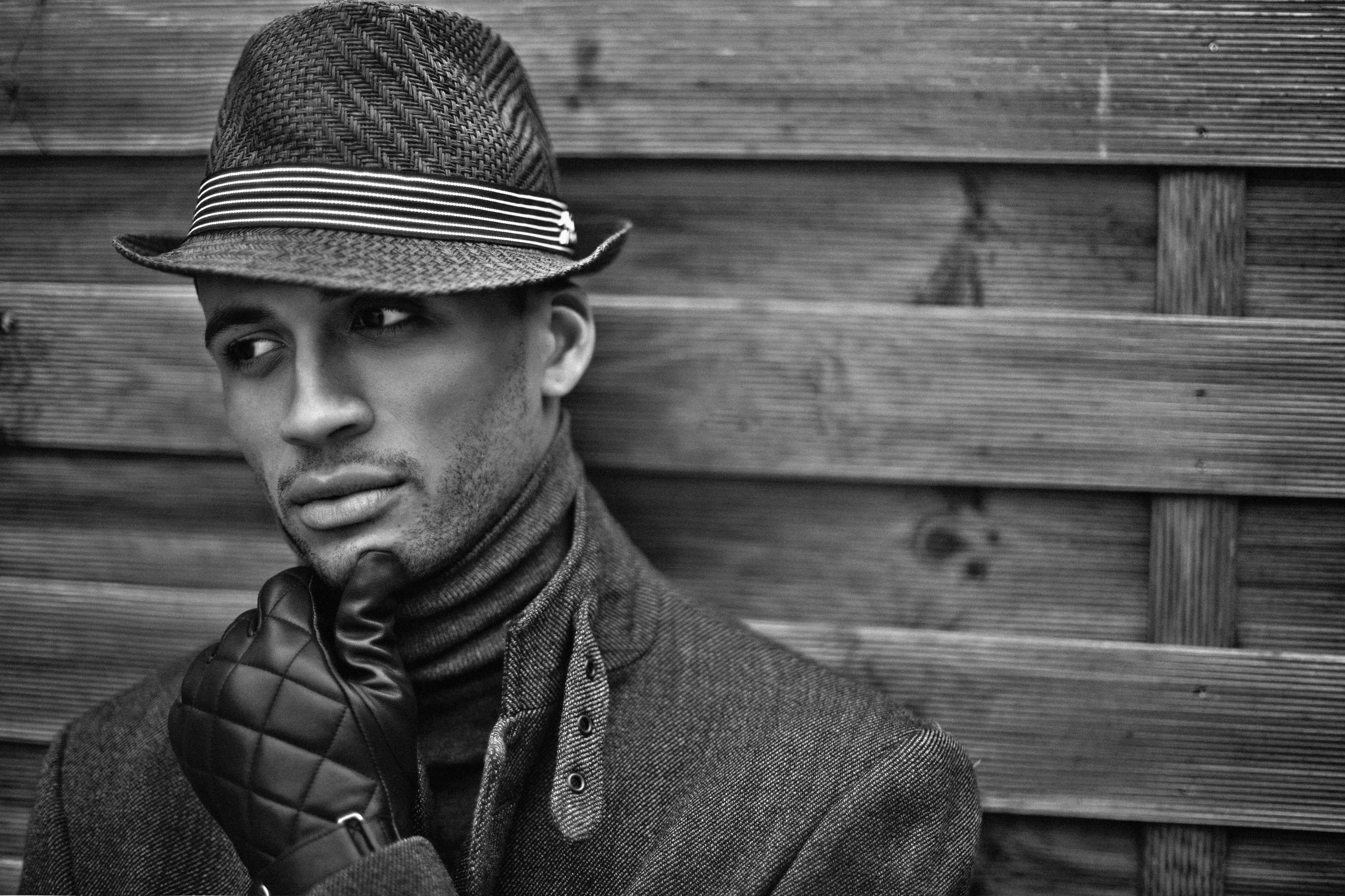 hat, one person, winter, hand, clothing, headshot, face, looking at camera, wood, black and white, rustic, leisure activity, wall, young adult, day, scarf, HD Wallpaper